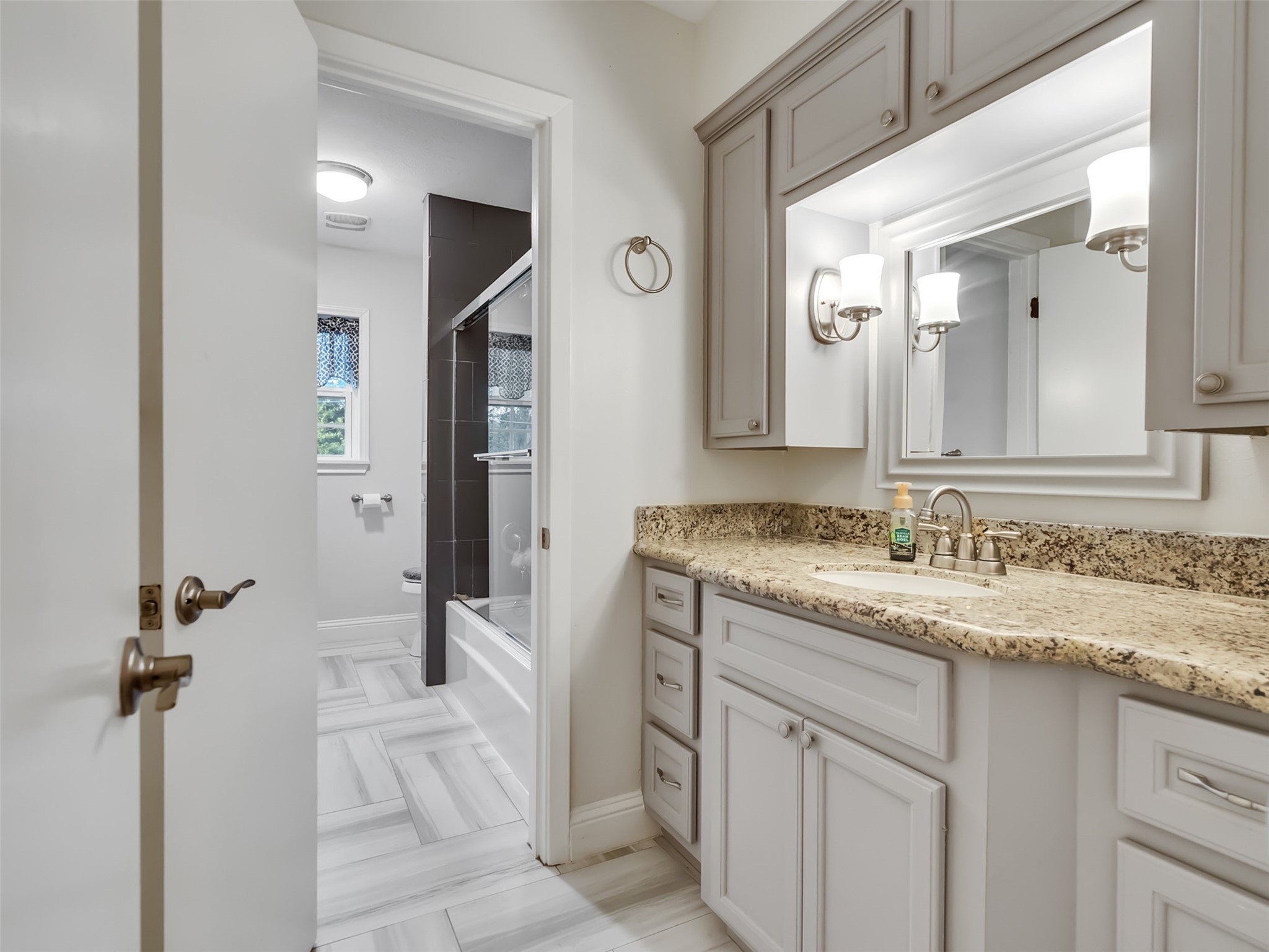 Upstairs bathroom has functionality and style.