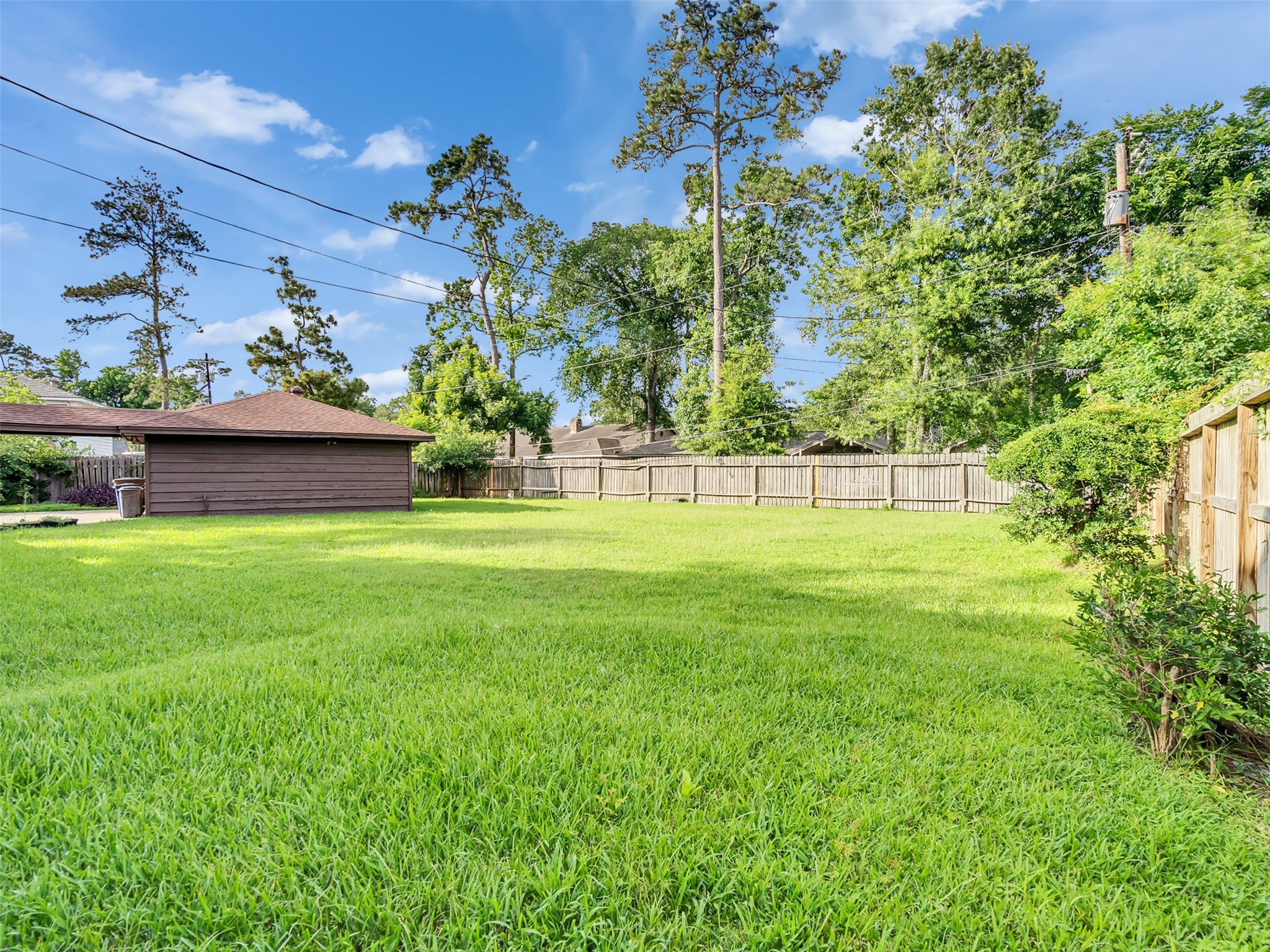 This oversized yard features plenty of open green space for gatherings, play, gardening, or future additions, with room to truly spread out and enjoy. This oversized yard features plenty of open green space for gatherings, play, gardening, or future additions, with room to truly spread out and enjoy.
