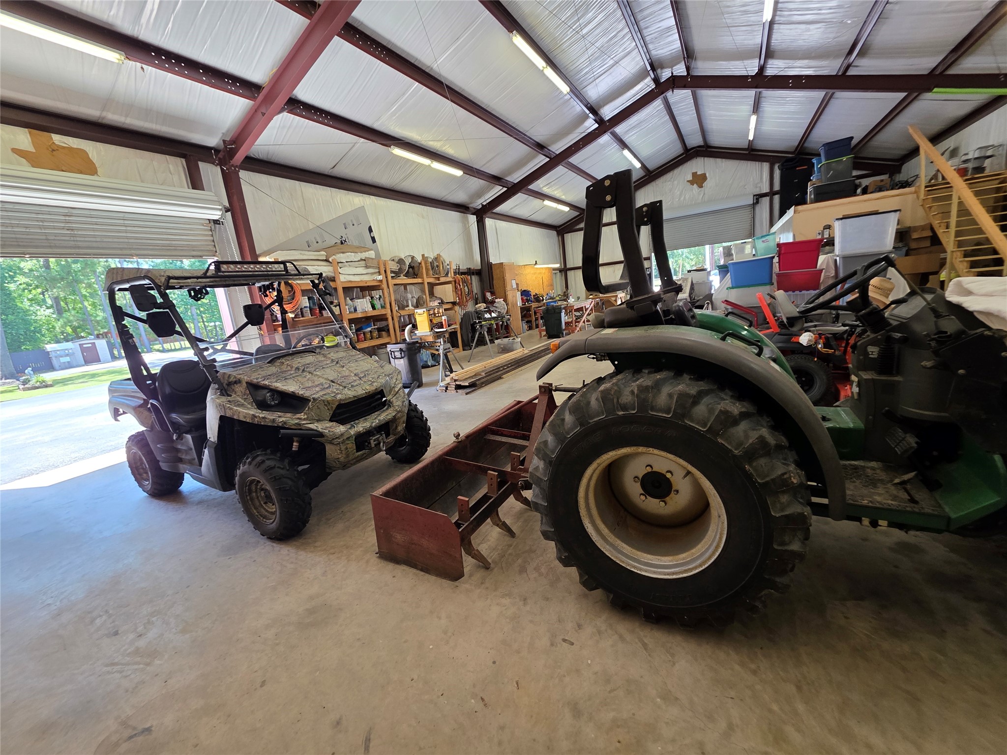 Exceptional space built to accommodate heavy-duty work vehicles and commercial equipment, collector or grown up toys