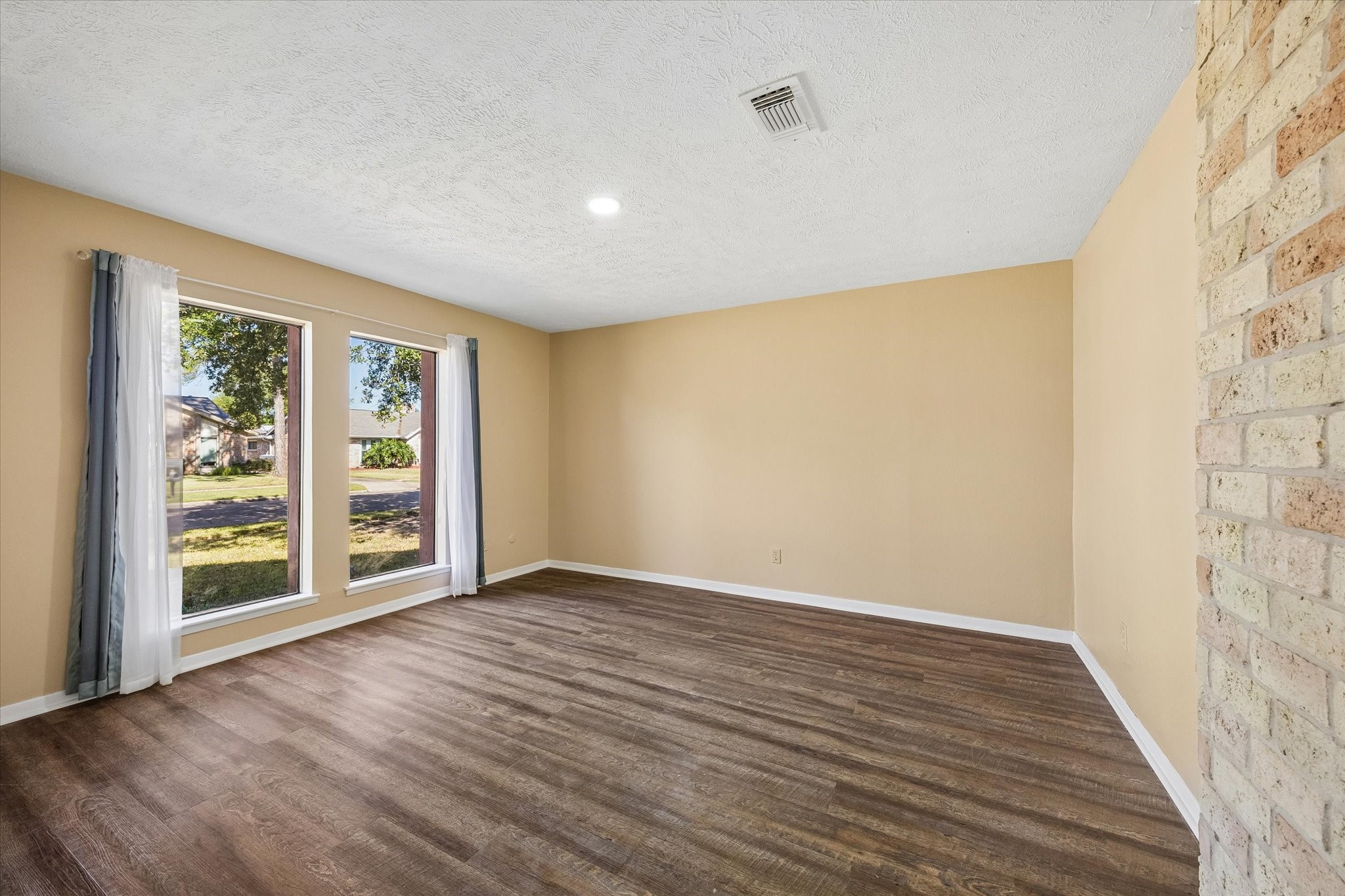 Bright and inviting office with large windows.