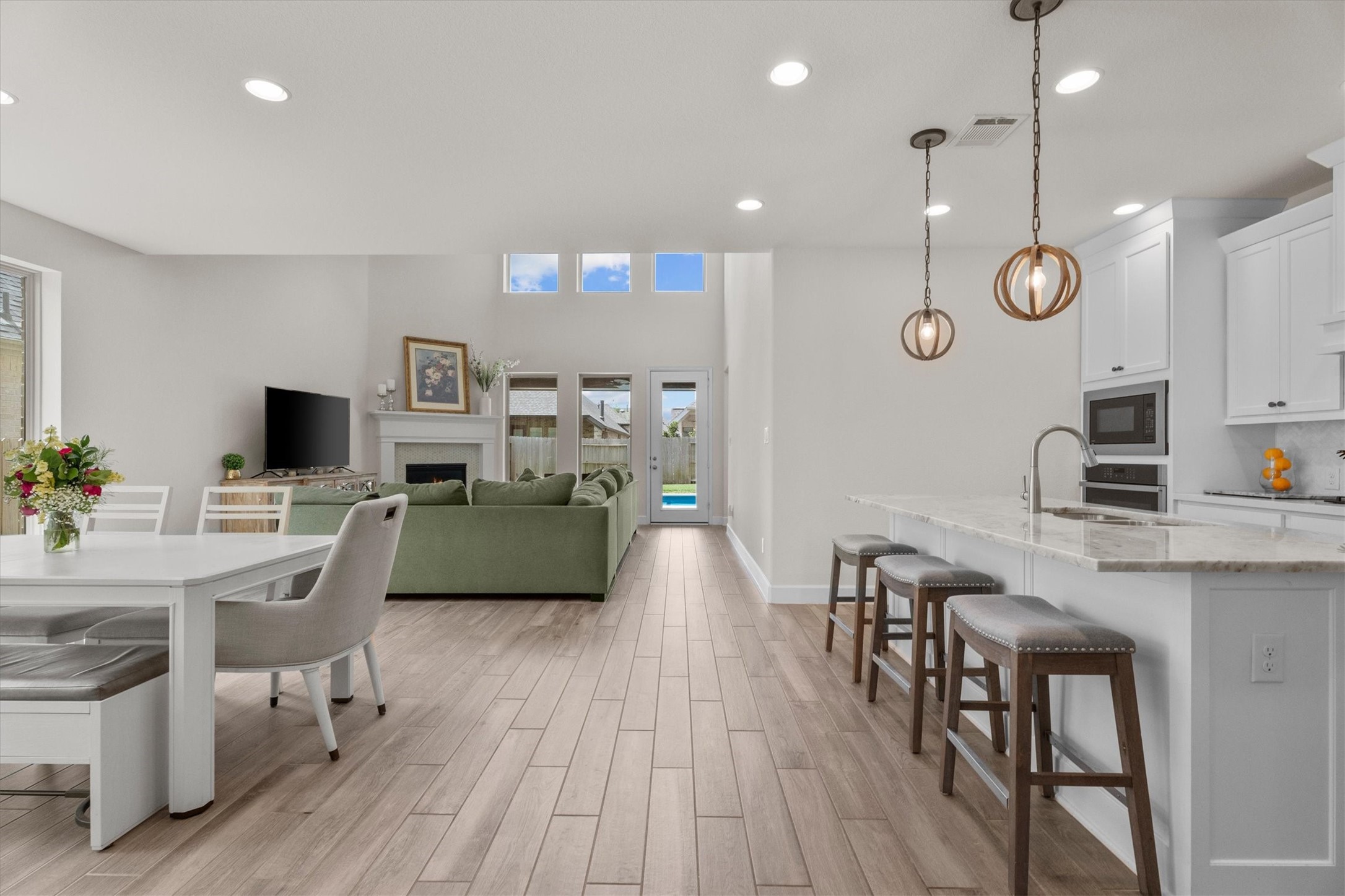 An open-concept design with plenty of natural light creates a space where everyone comes together.