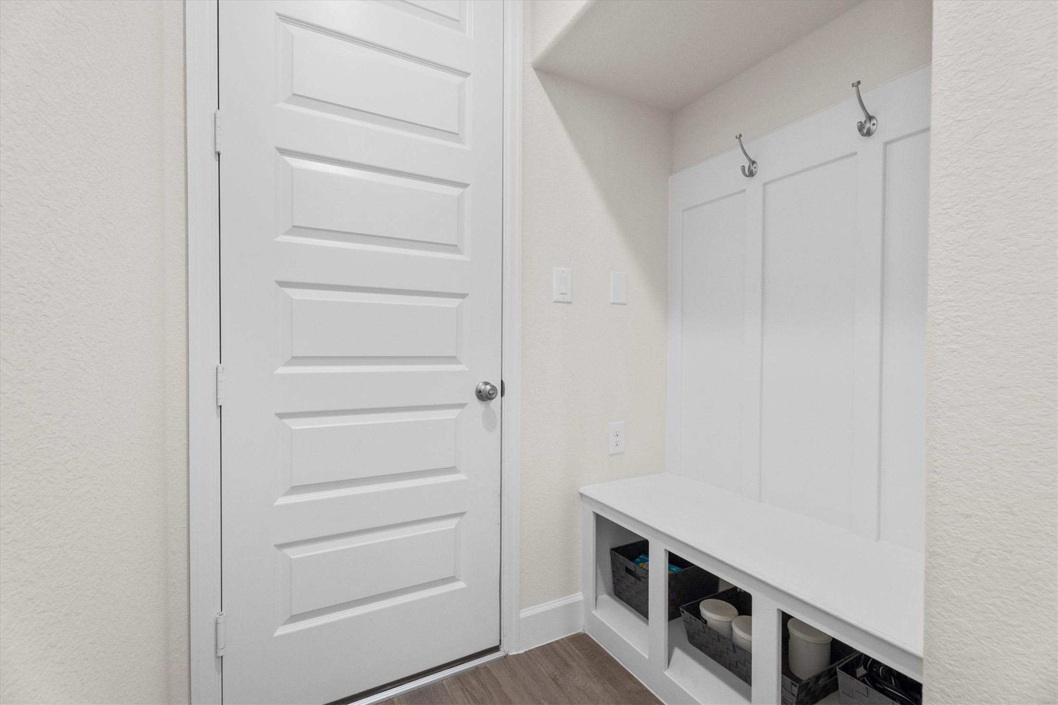 The perfect landing spot for backpacks, shoes, groceries, and everything in between.