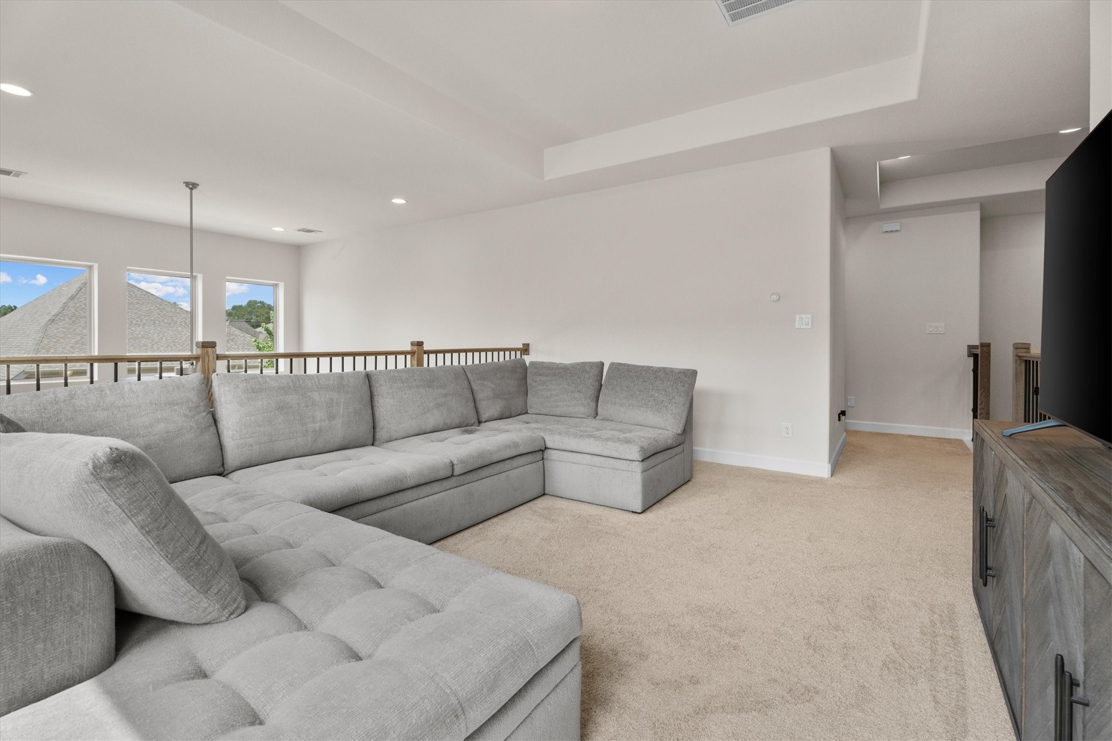 Whether it's game day, homework, or family movie night, this flexible space is ready for it all.