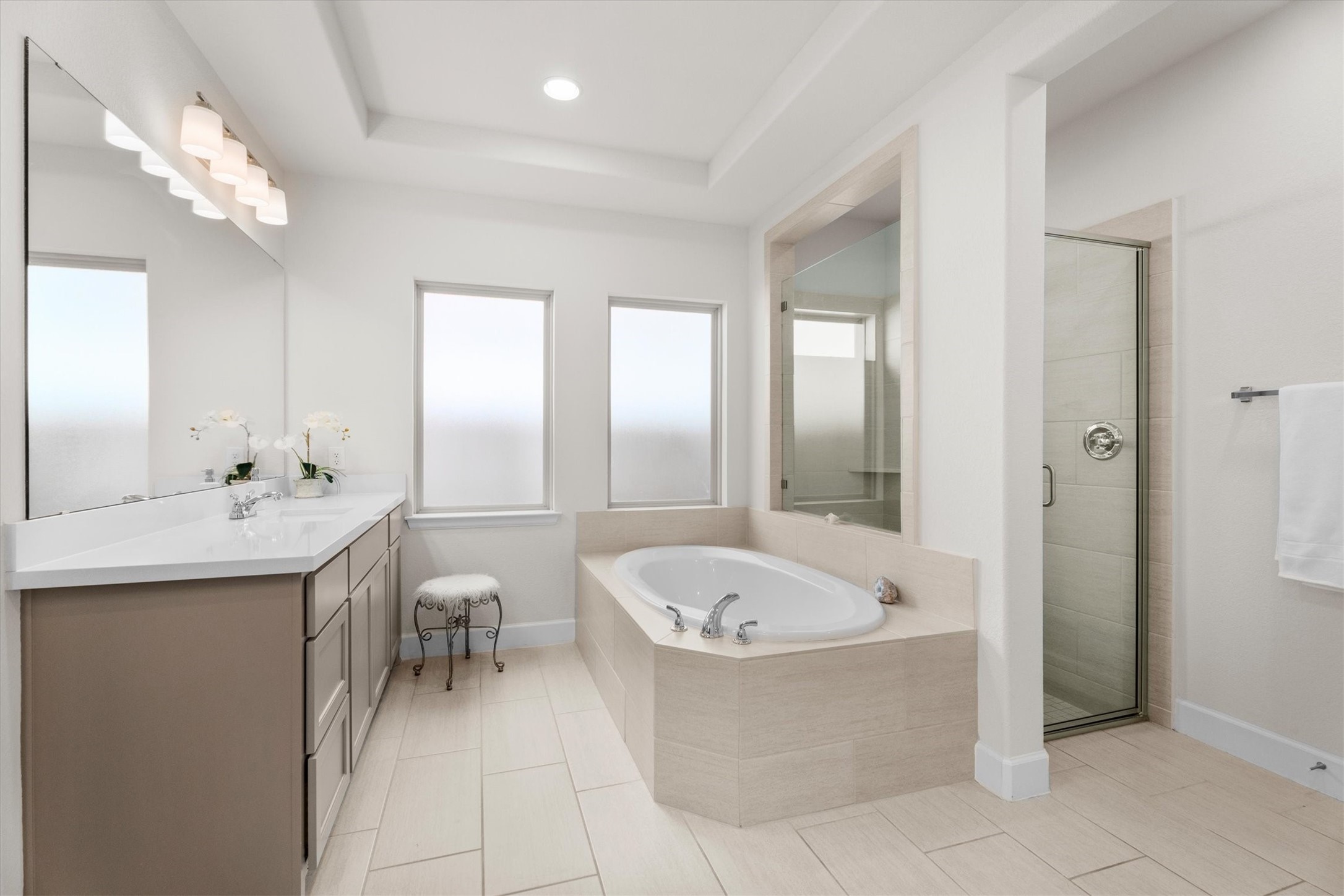 Retreat to a primary bath that feels like your own private spa.