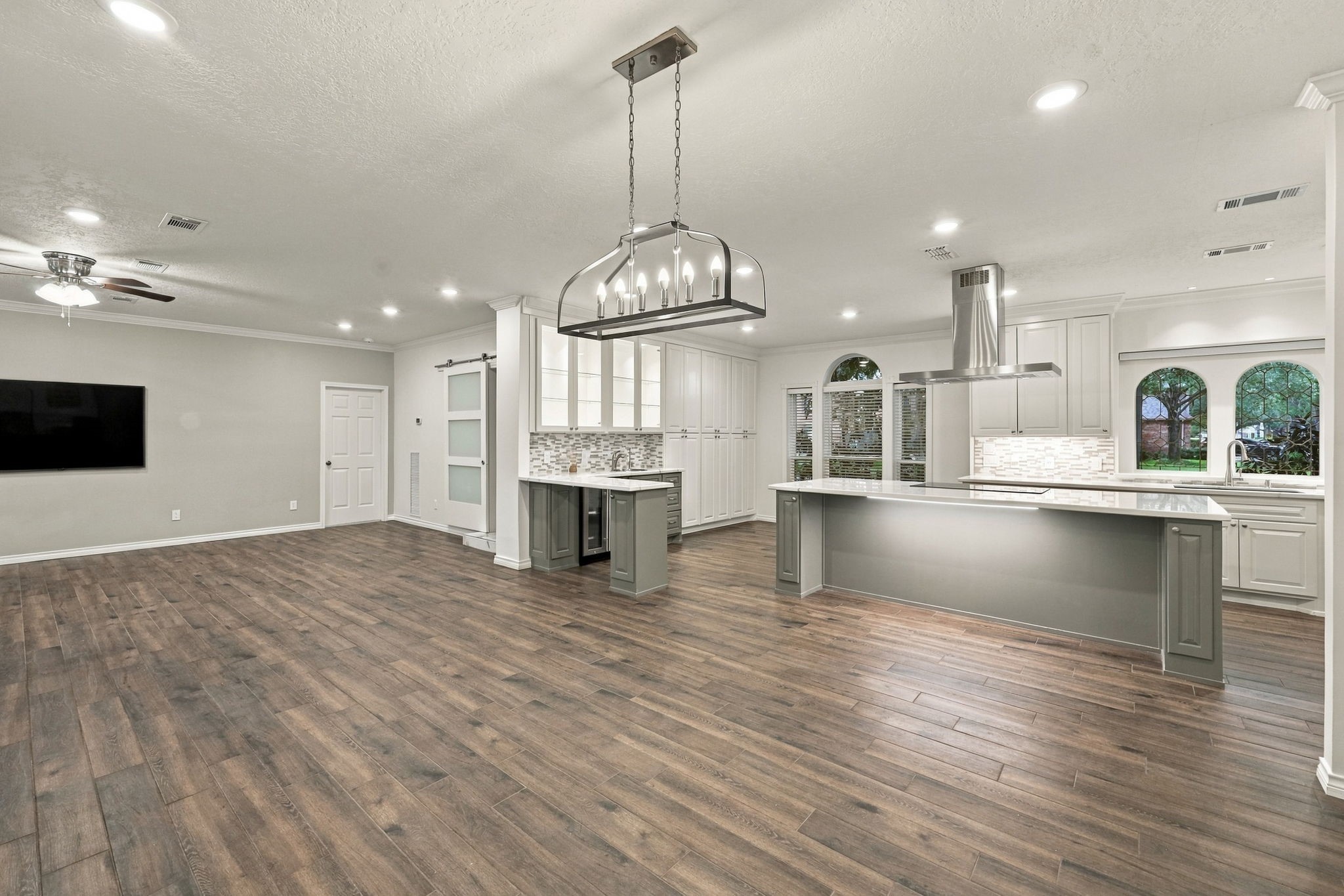 Spacious open-concept layout connecting the updated kitchen with the adjoining living area.