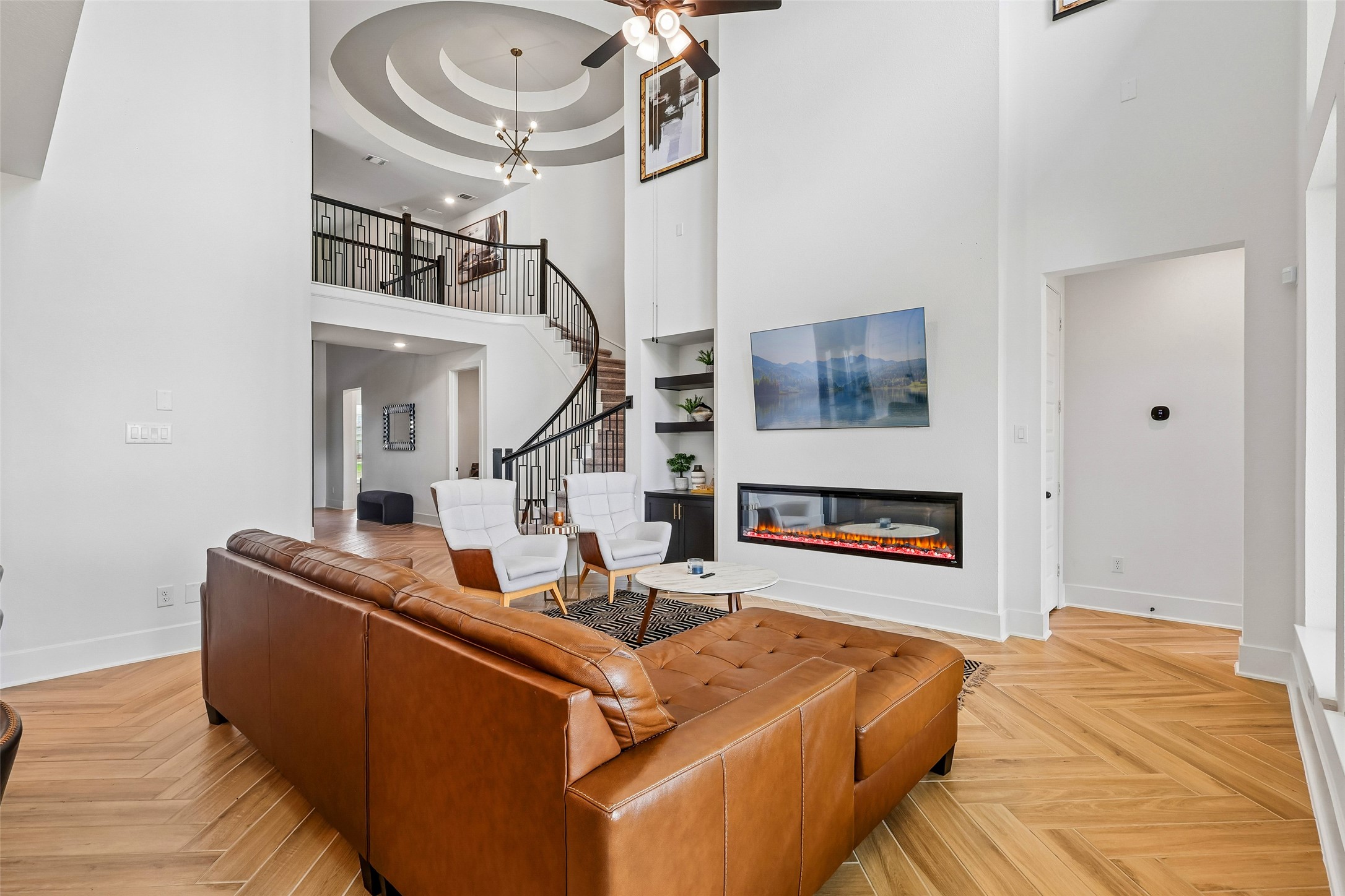 Stunning view from the main living room, signature Westin spiral stair case and tray ceiling