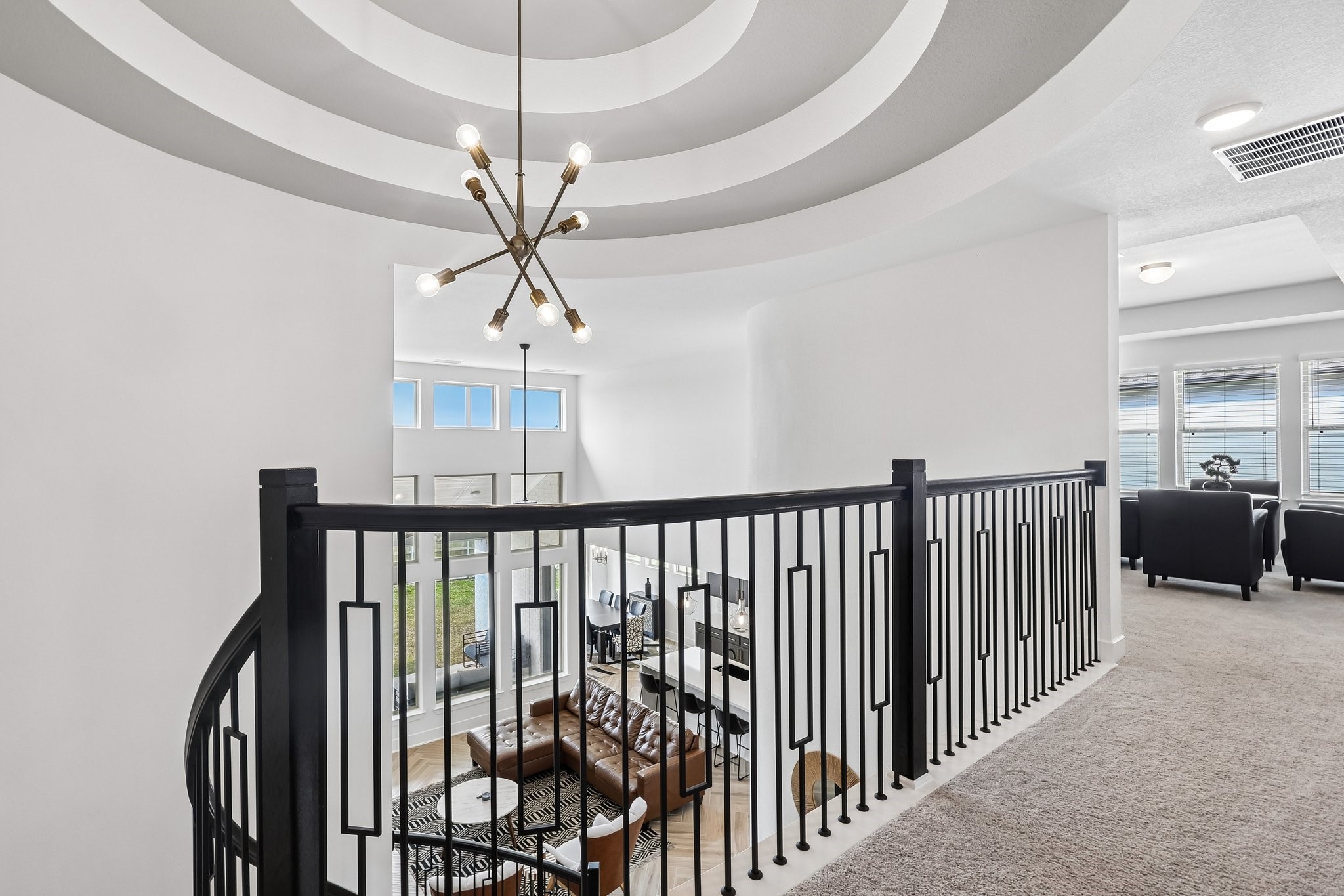 Another view of the tray ceiling and chandelier