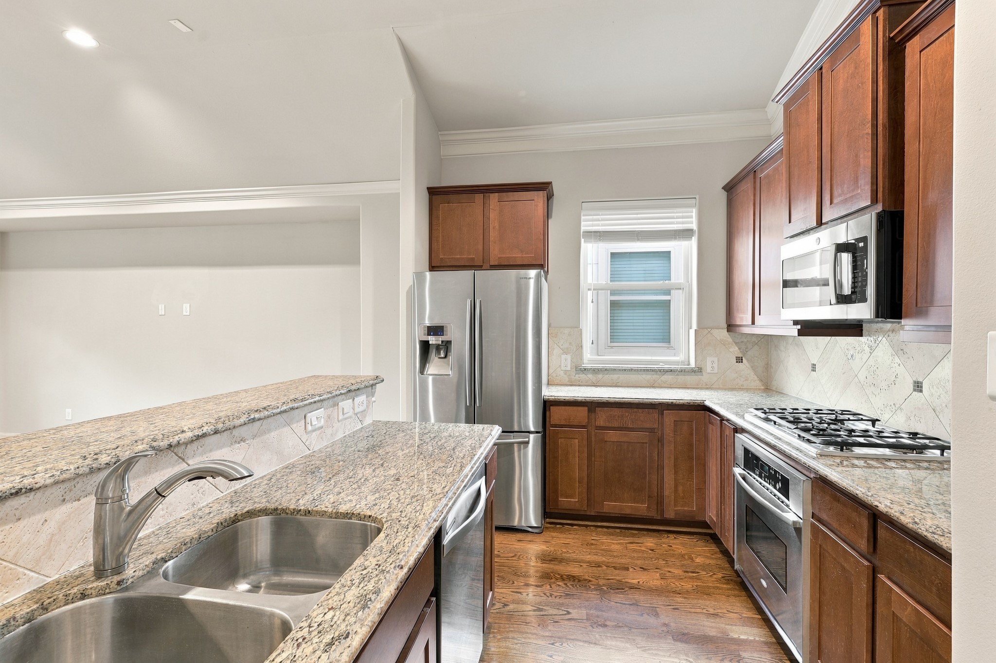 Kitchen island with a breakfast bar.