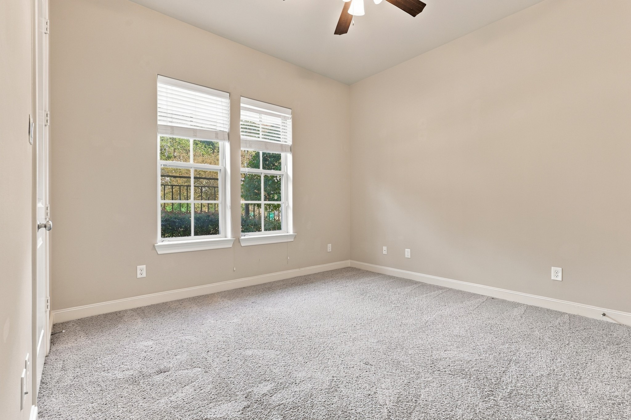 Second bedroom downstairs facing street.