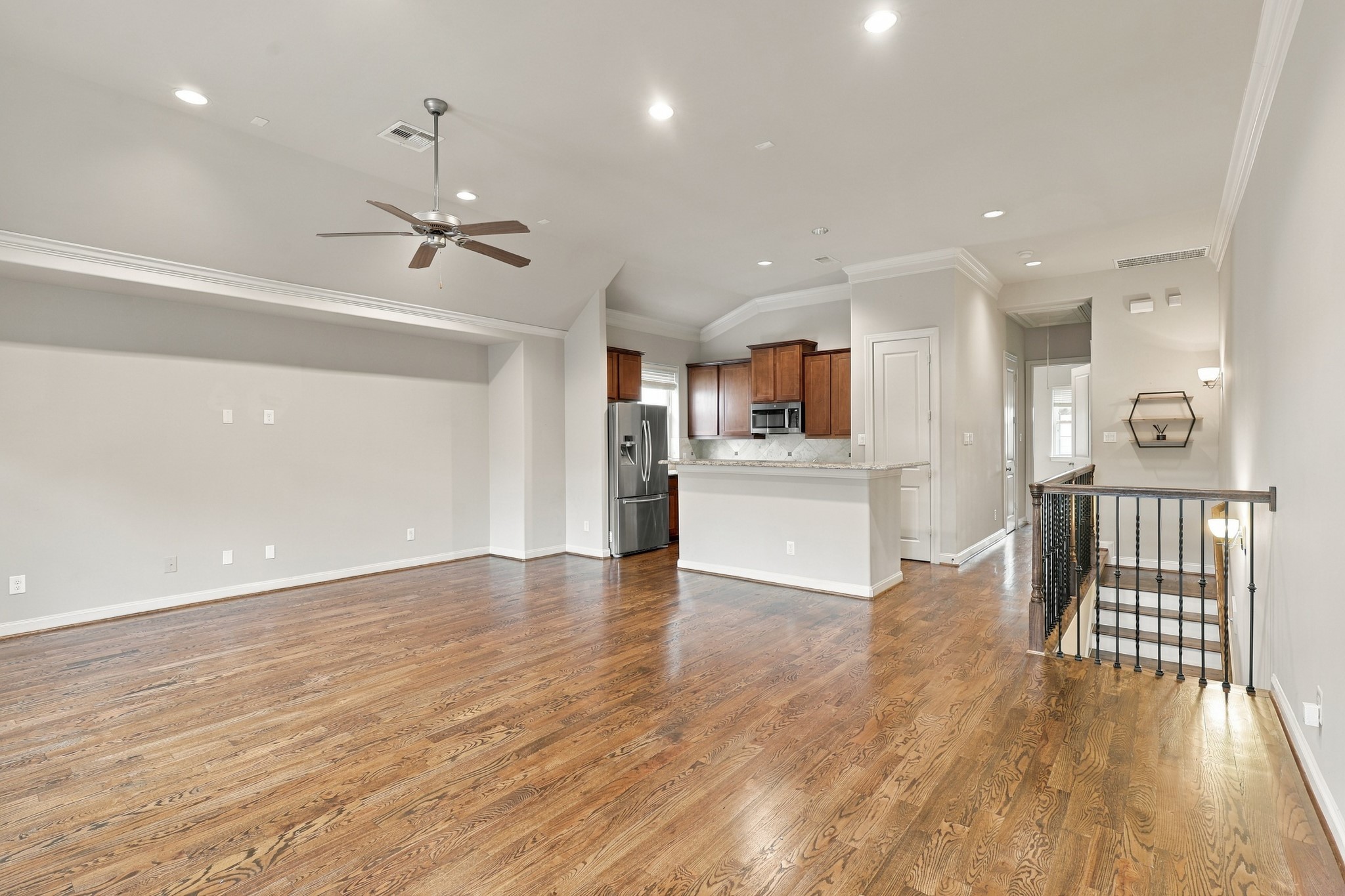 Natural light shining into living space with recessed lights.