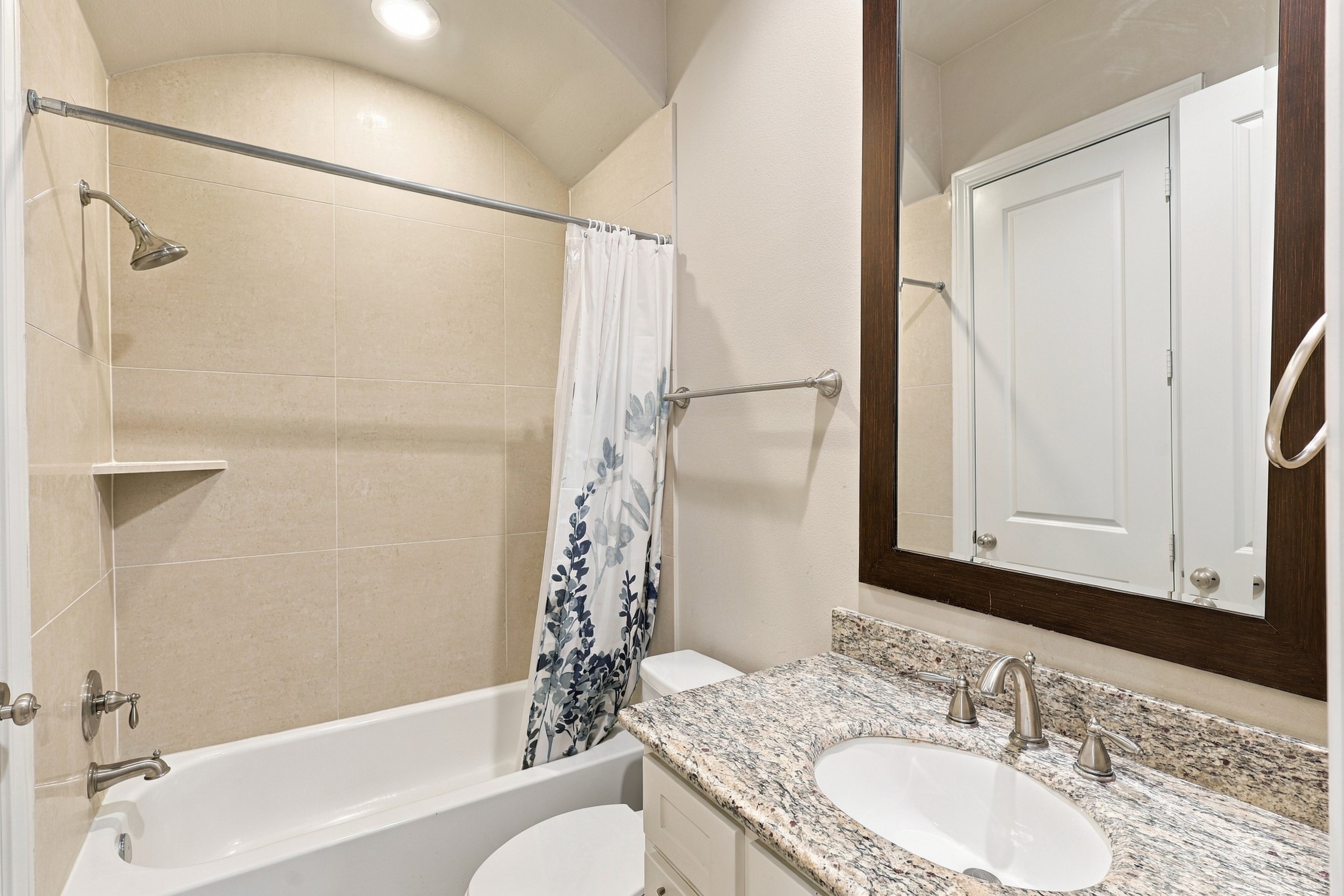 Full bath connected to second bedroom and hallway.