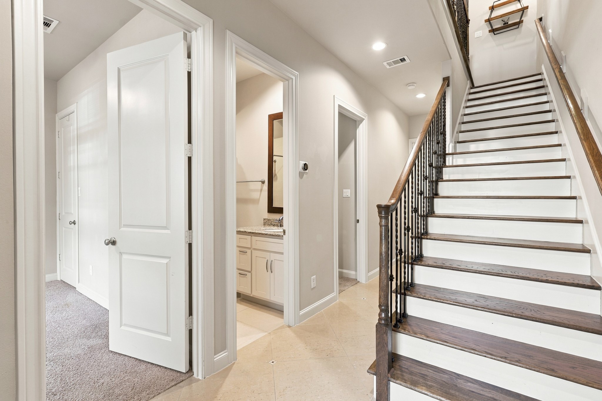 Two bedrooms and a full bath downstairs.