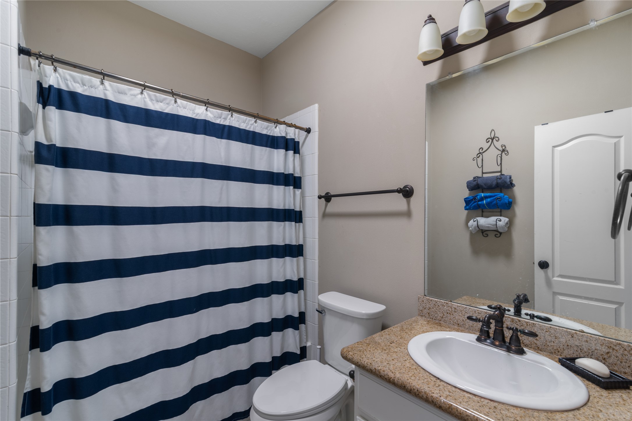 Full bathroom upstairs off the game room.