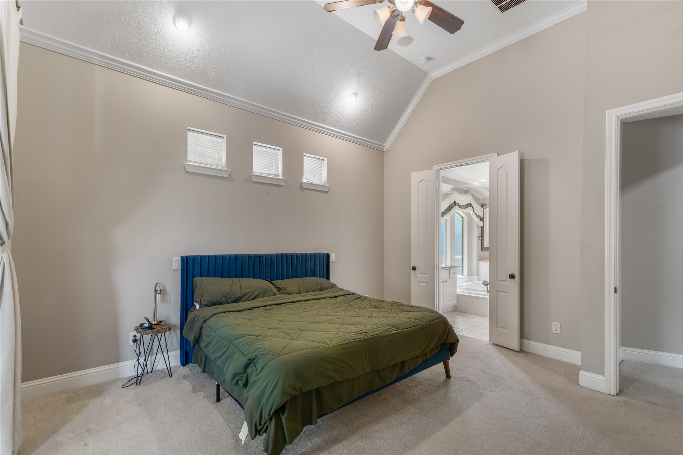 beautiful master suite with vaulted ceilings.