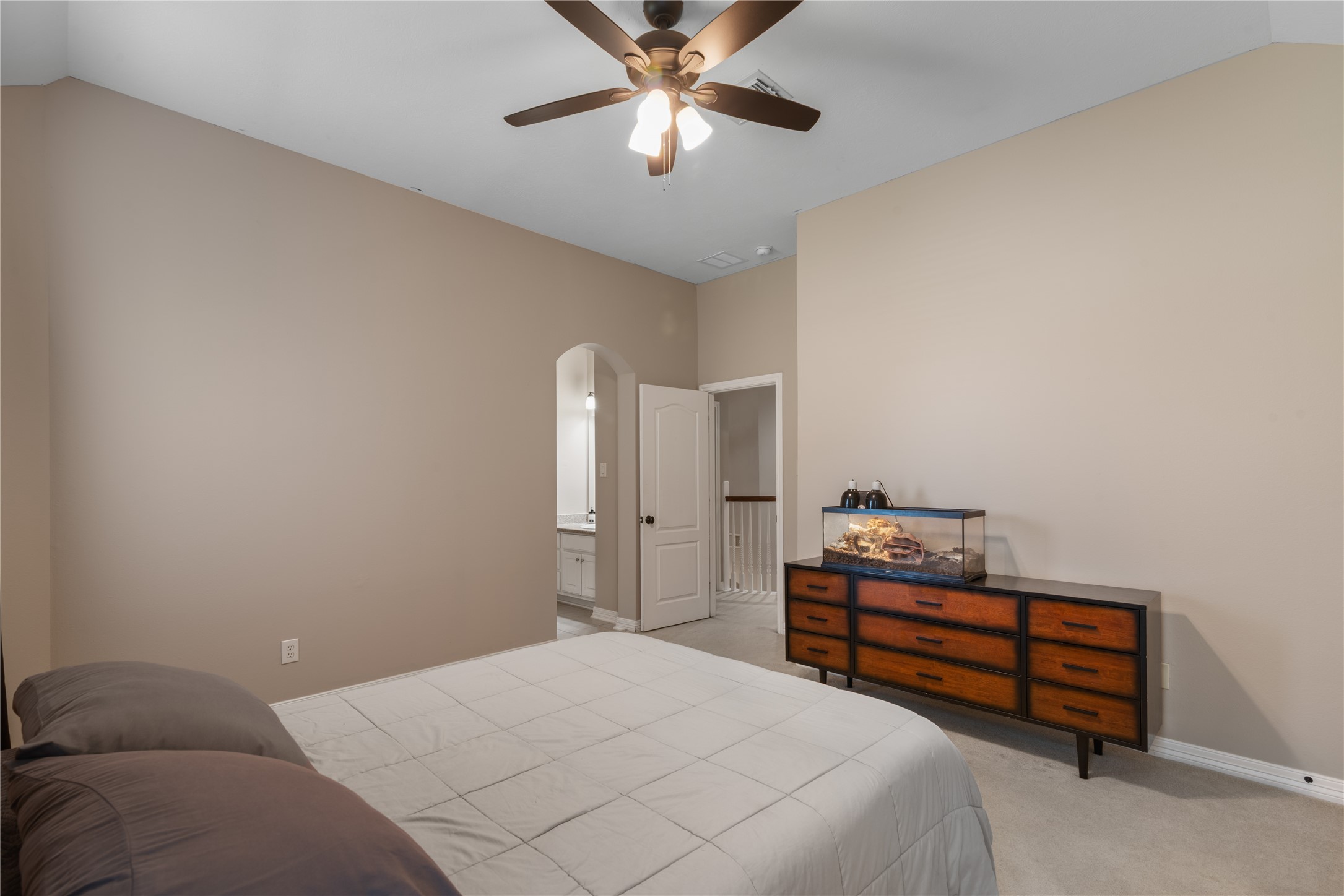 Another secondary bedroom upstairs off the game room with a shared bathroom with bedroom next door.