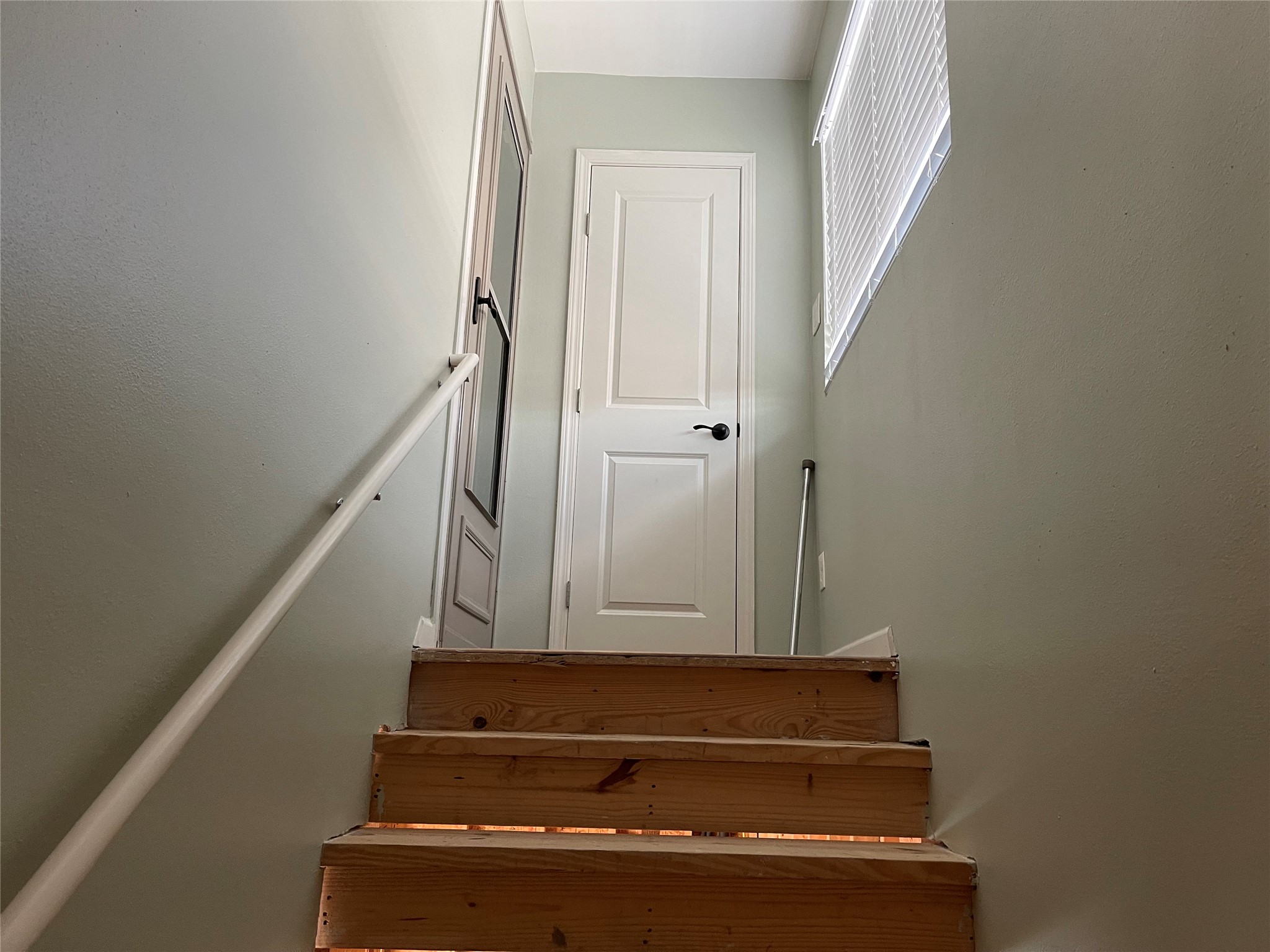 Stairs to the game room in garage