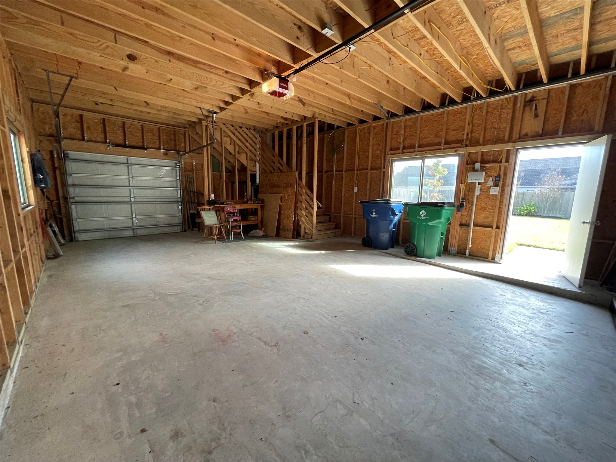 Interior of the garage with stairs to the game room