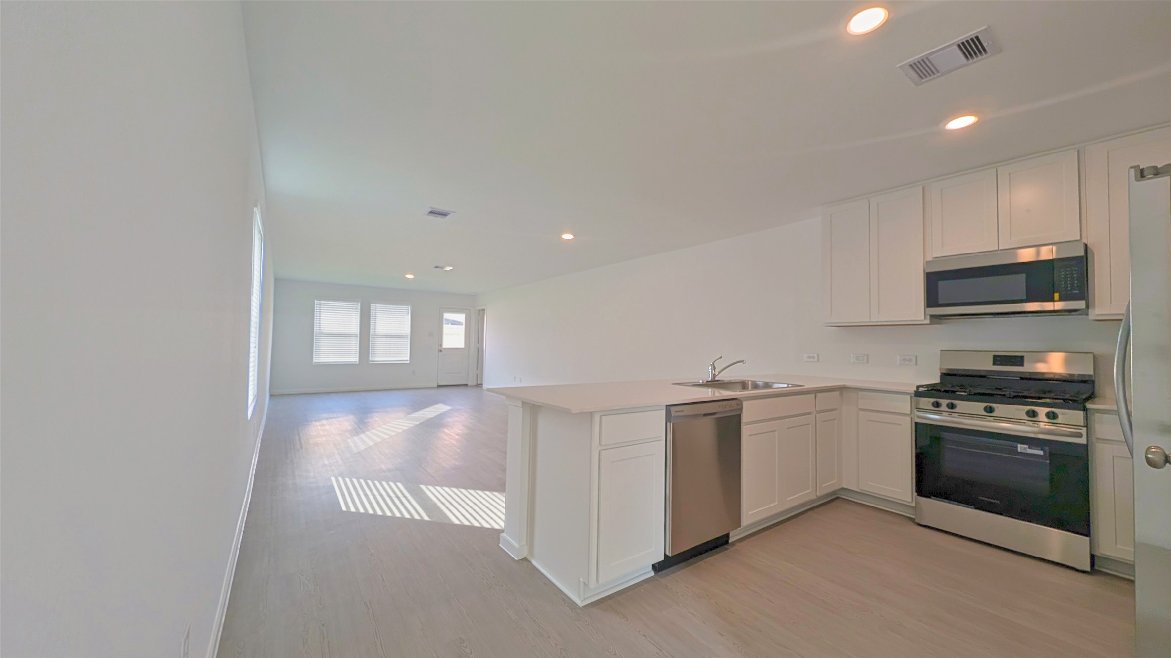 Kitchen open to living area