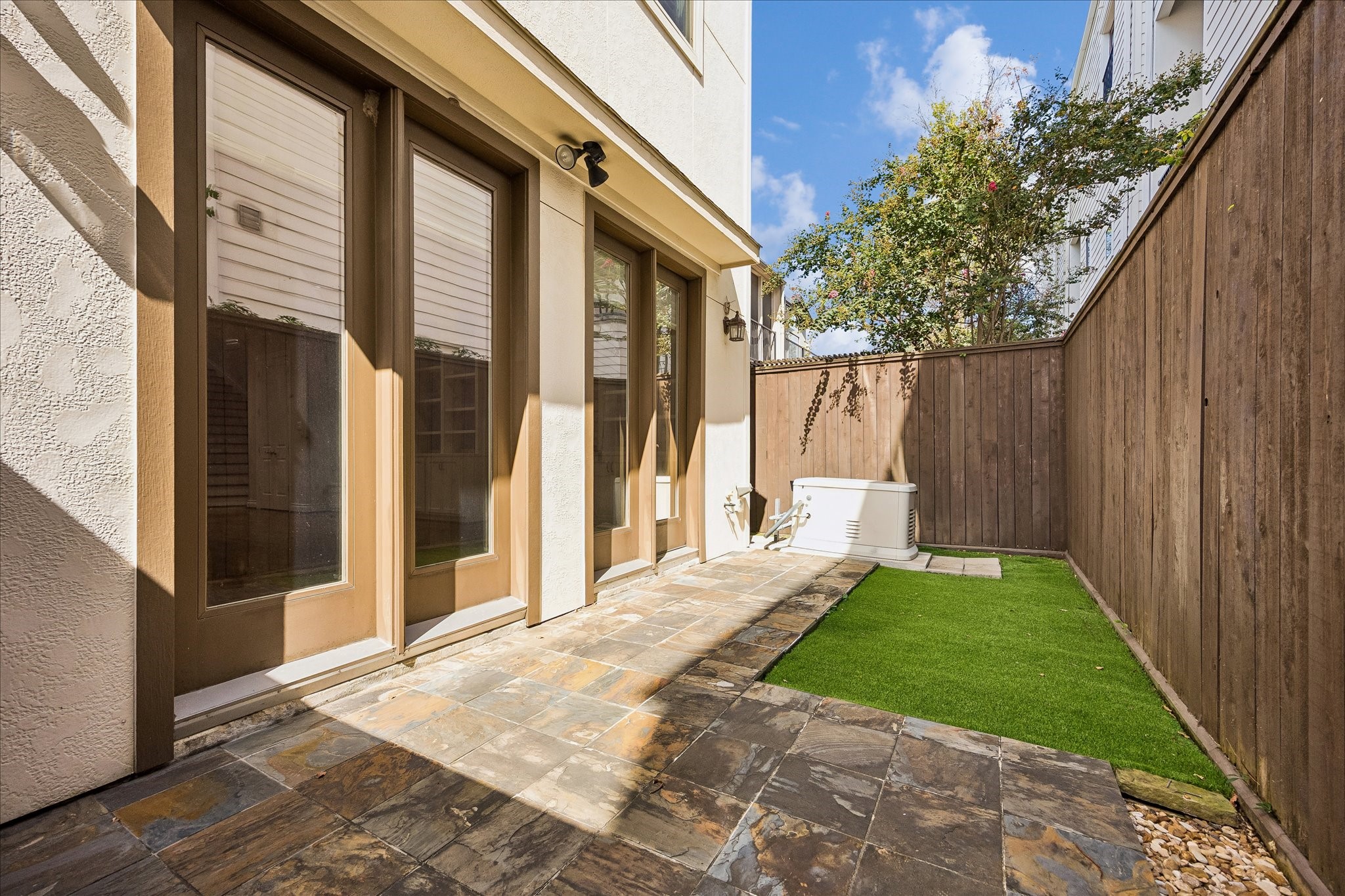 Turfed backyard and whole home generator!