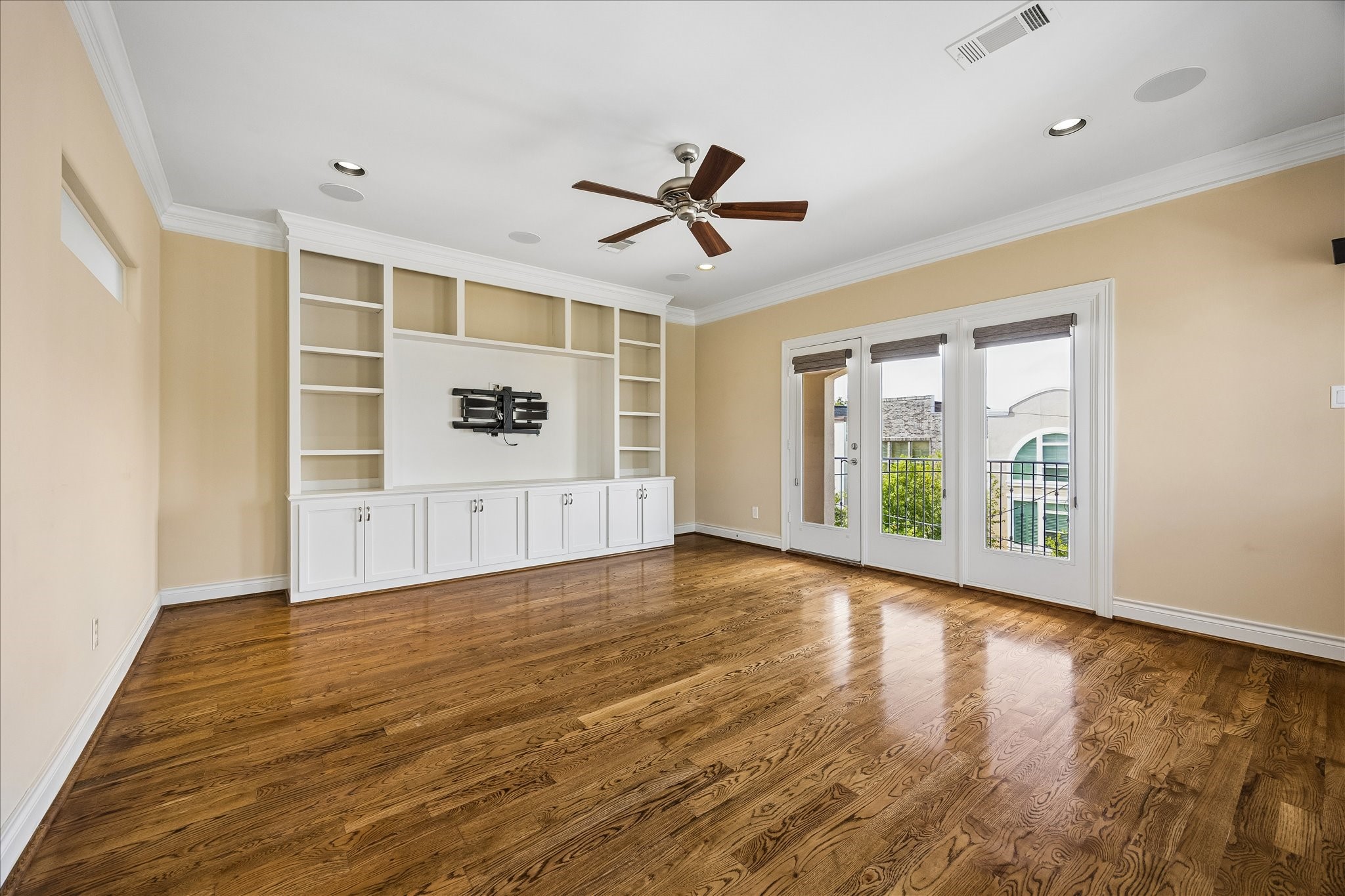 3rd floor game room with balcony and natural light