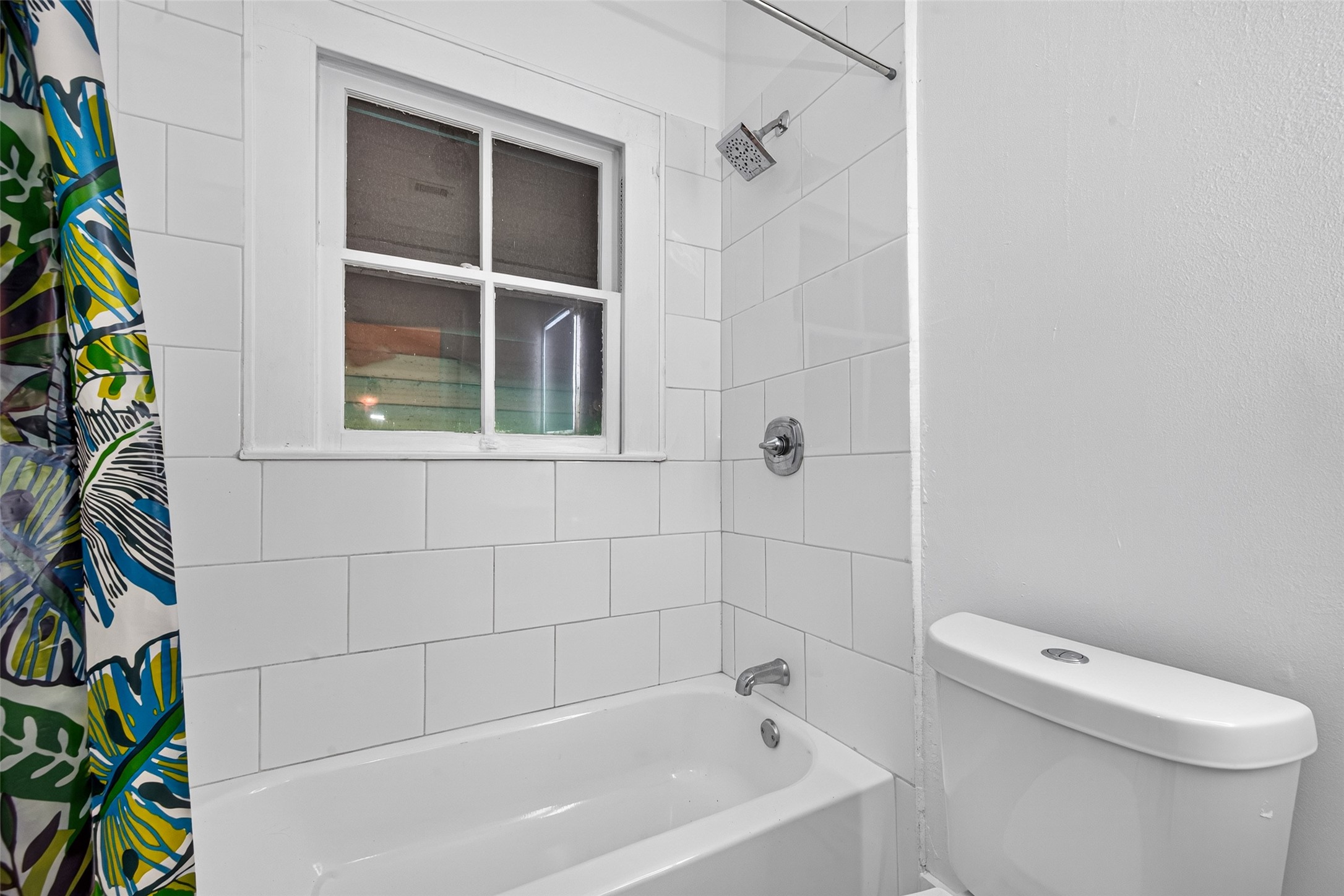 UPDATED BATHROOM WITH FULL SIZED TUB