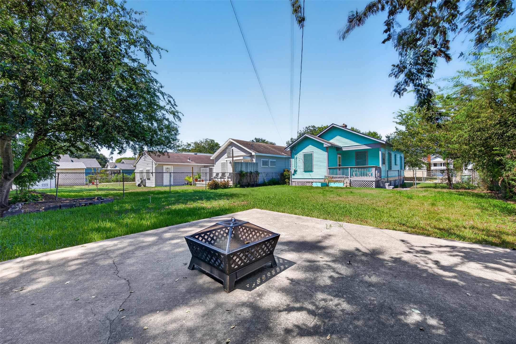 LARGE YARD WITH CONCRETE PAD