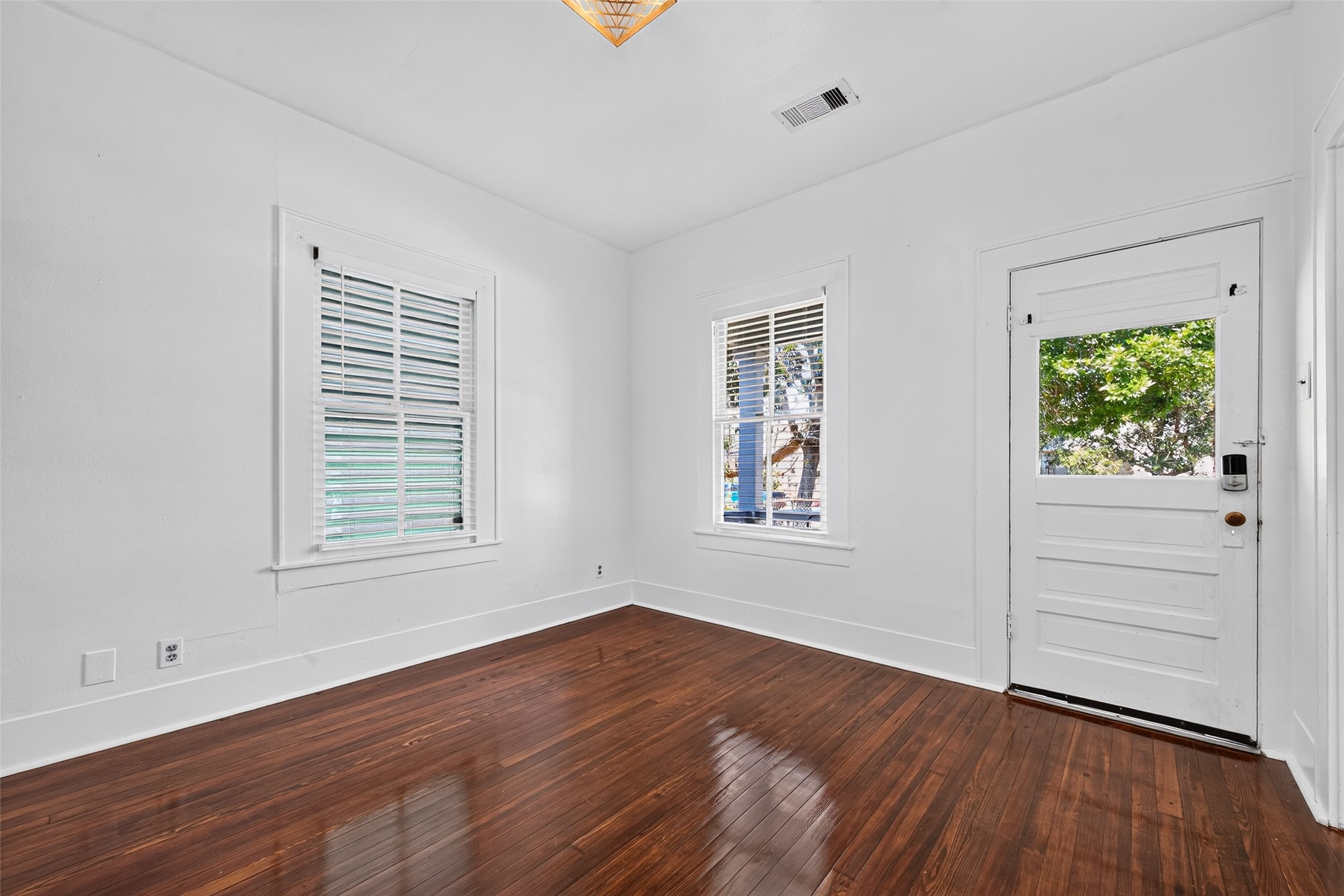 LIVING ROOM LOOKING TOWARD FRONT PORCH