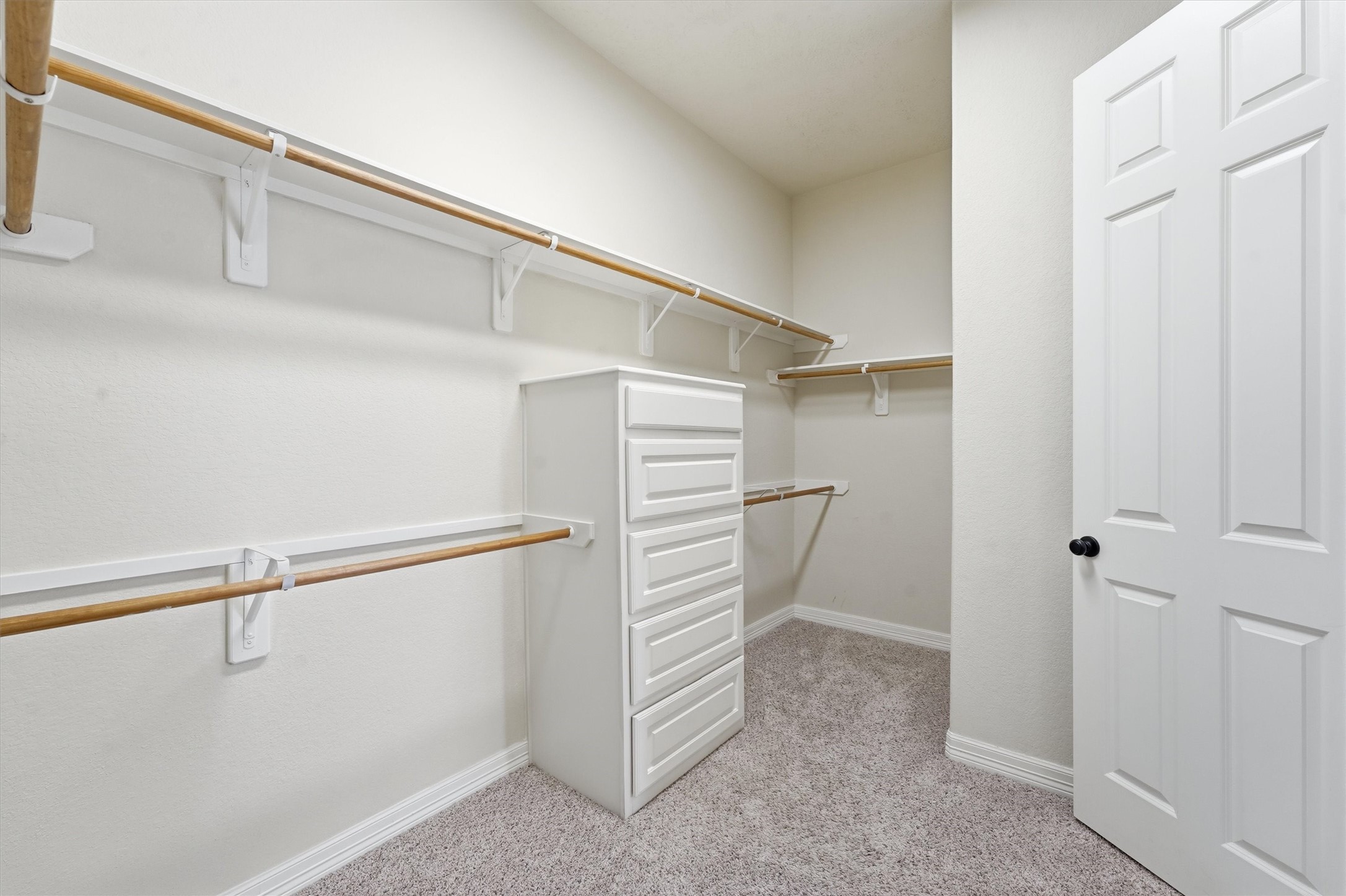 Large primary closet with built-ins