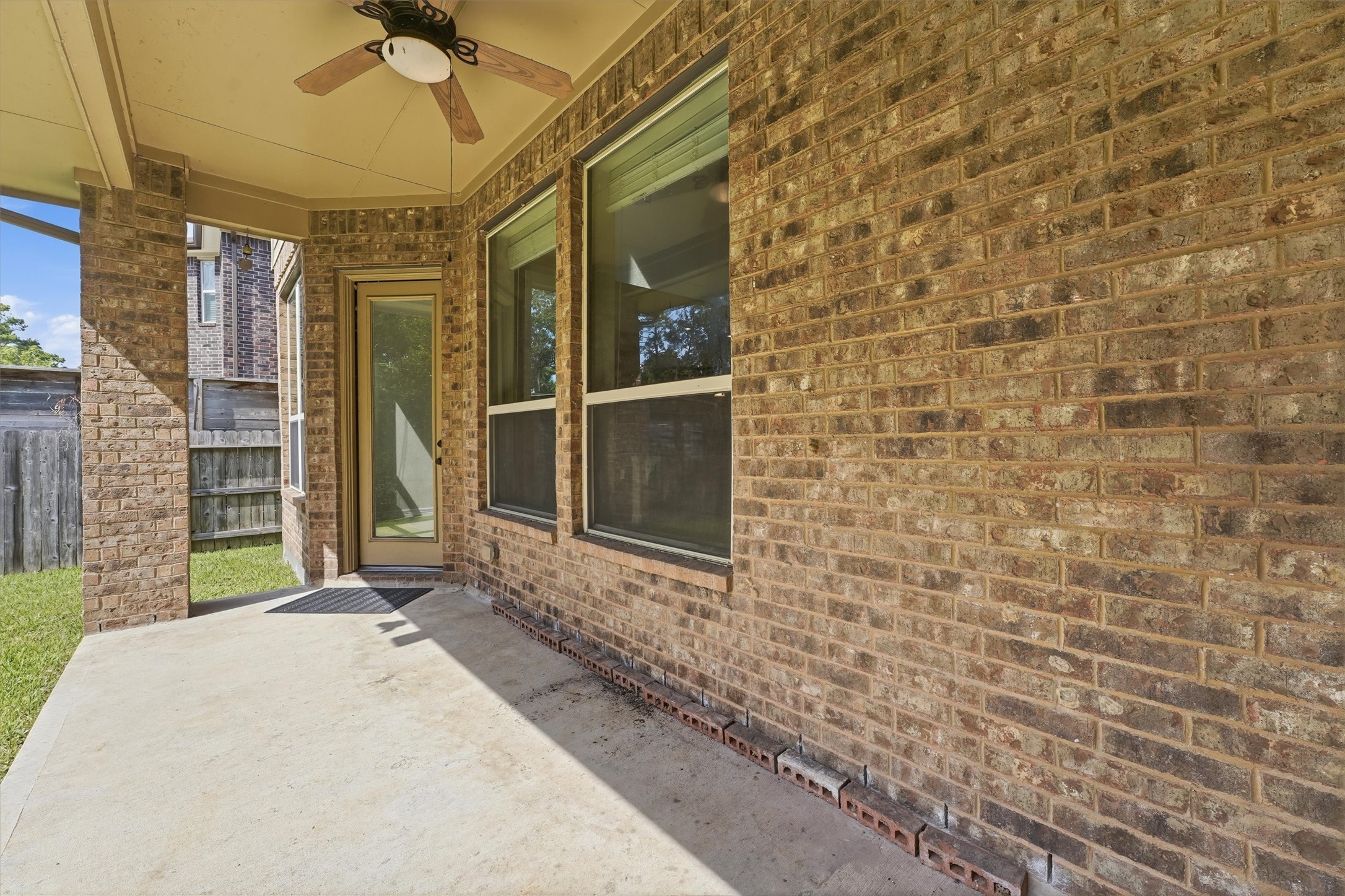 Covered back patio with beautiful views of the greenbelt