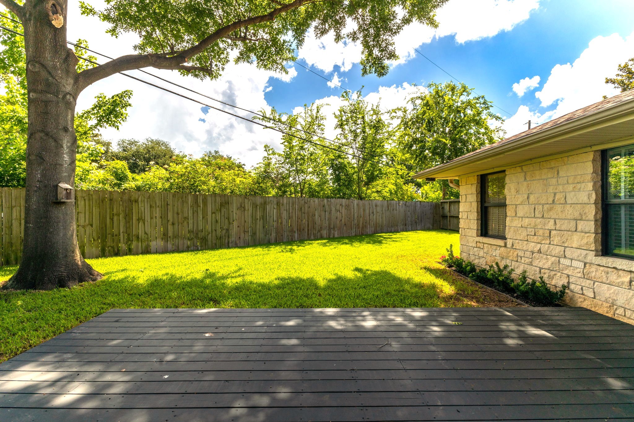 Backyard - with new large wood deck