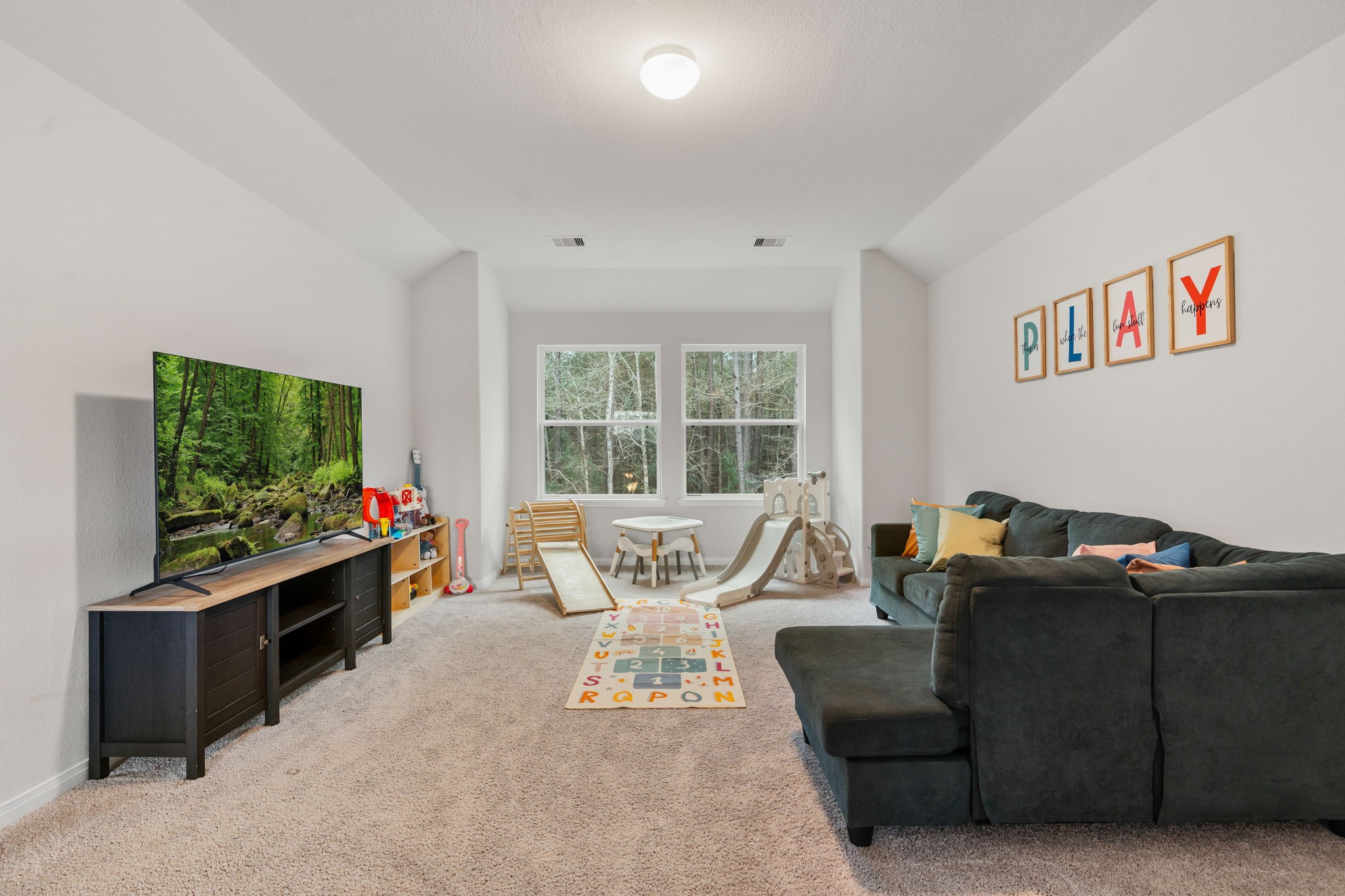 This upstairs game room offers the prefect spot for your kids to have their own play or entertainment area.