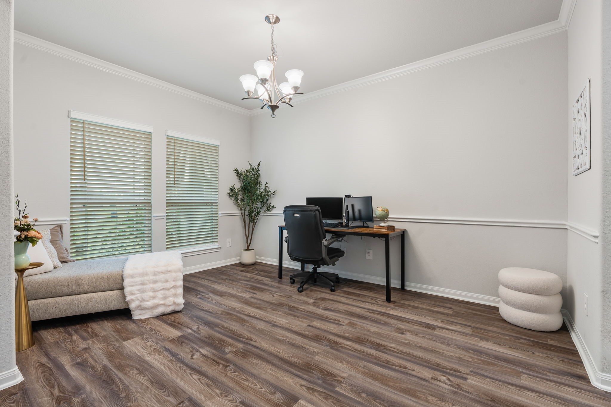 Currently used as an office this front room could also be a formal dining room.