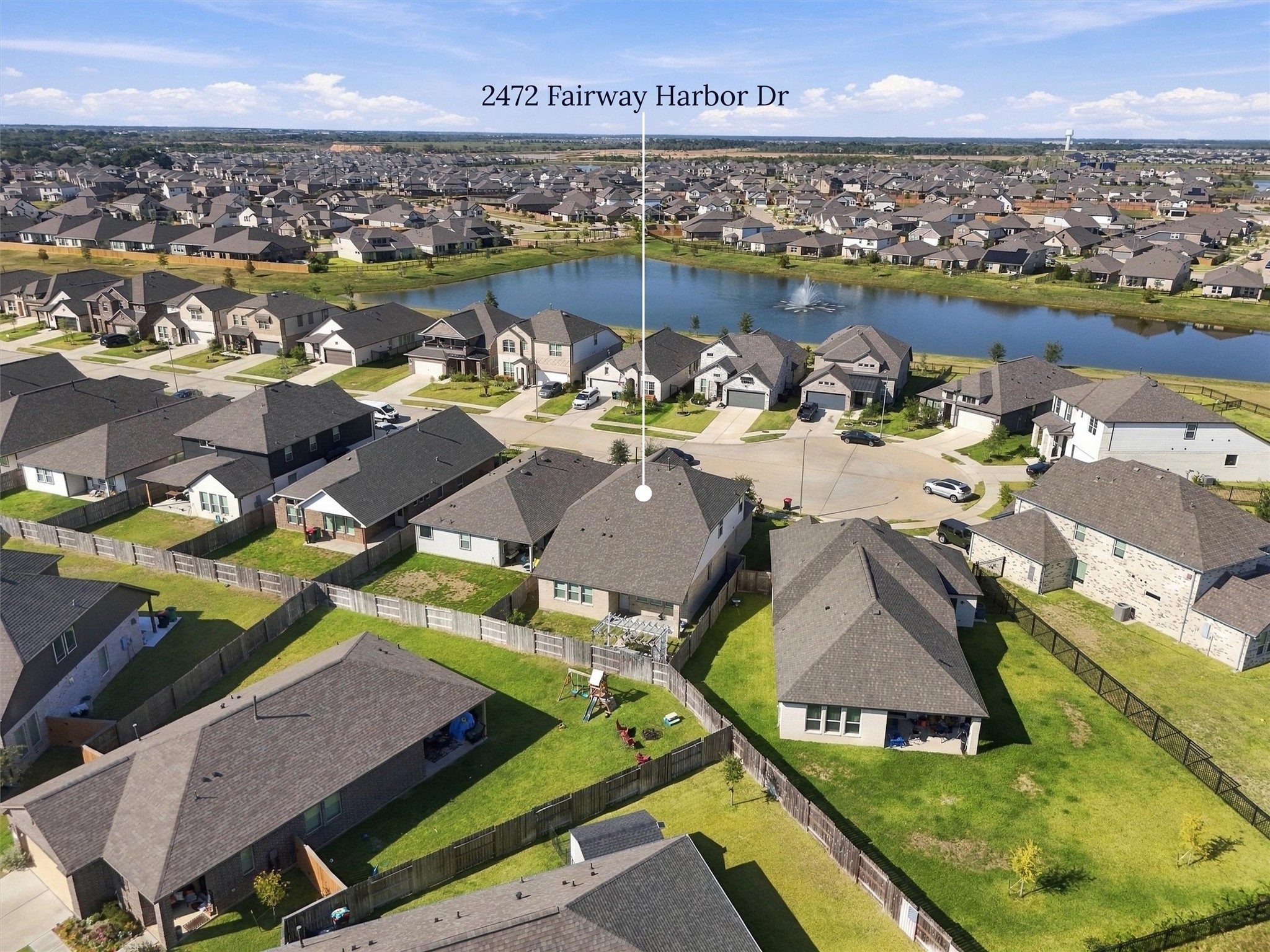 Aerial view showcasing the home's location within the surrounding neighborhood.
