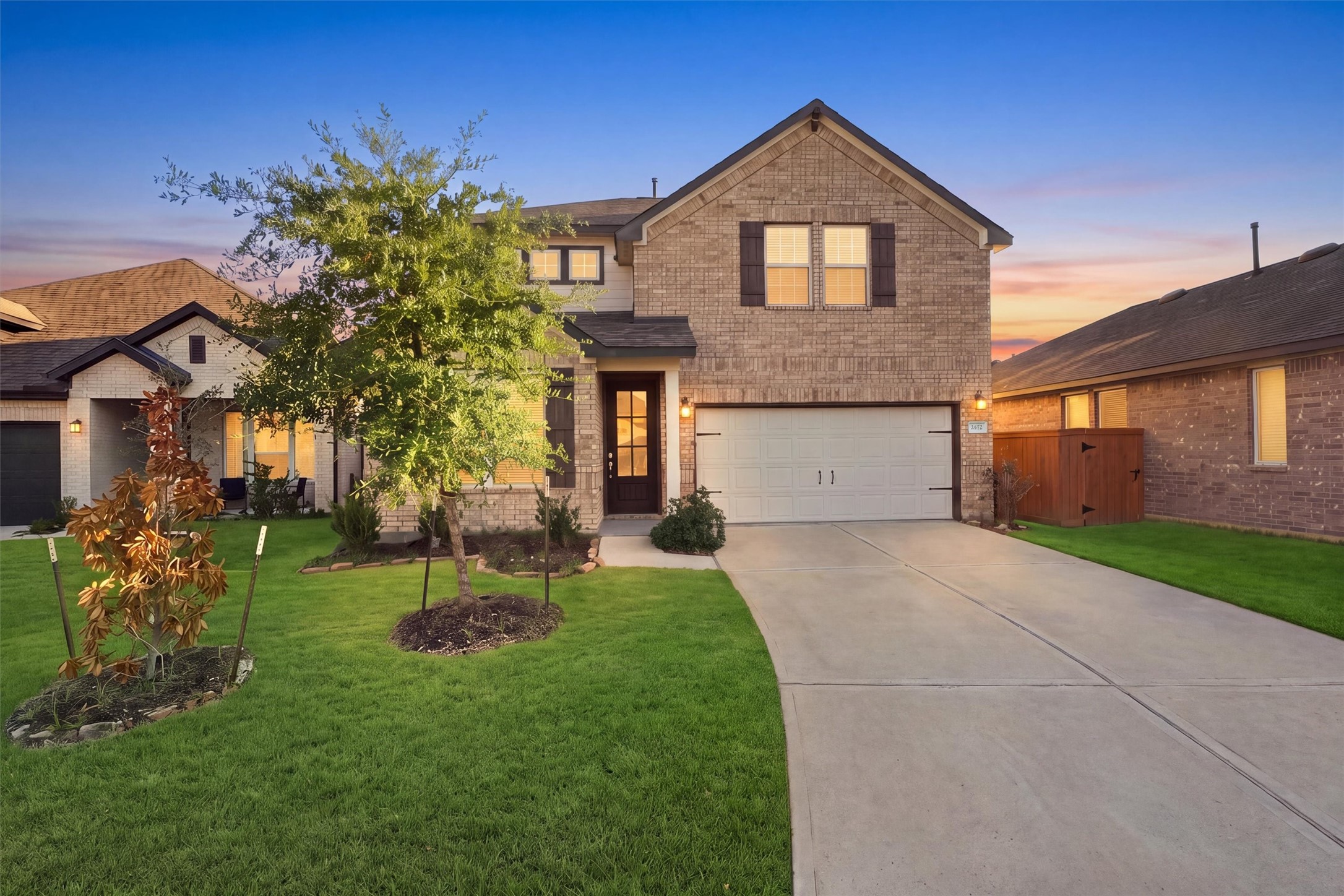 Beautiful two-story home featuring an attractive brick exterior and welcoming curb appeal. Beautiful two-story home featuring an attractive brick exterior and welcoming curb appeal.