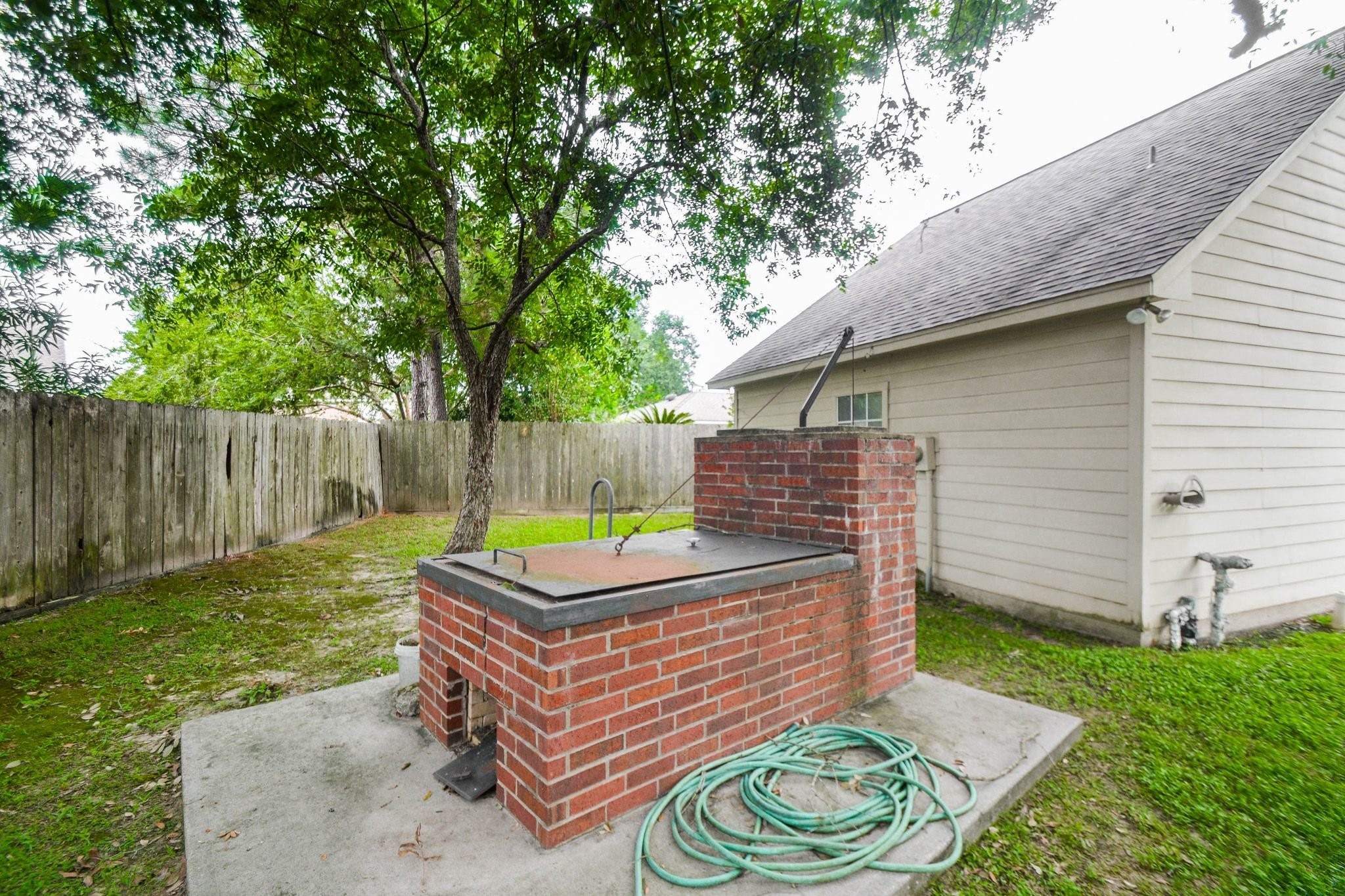 Custom BBQ Pit in the far back yard Custom BBQ Pit in the far back yard