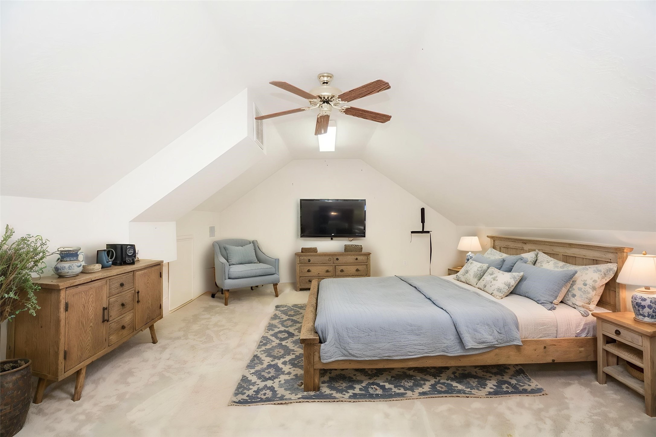 Room over the garage virtually staged as a bedroom