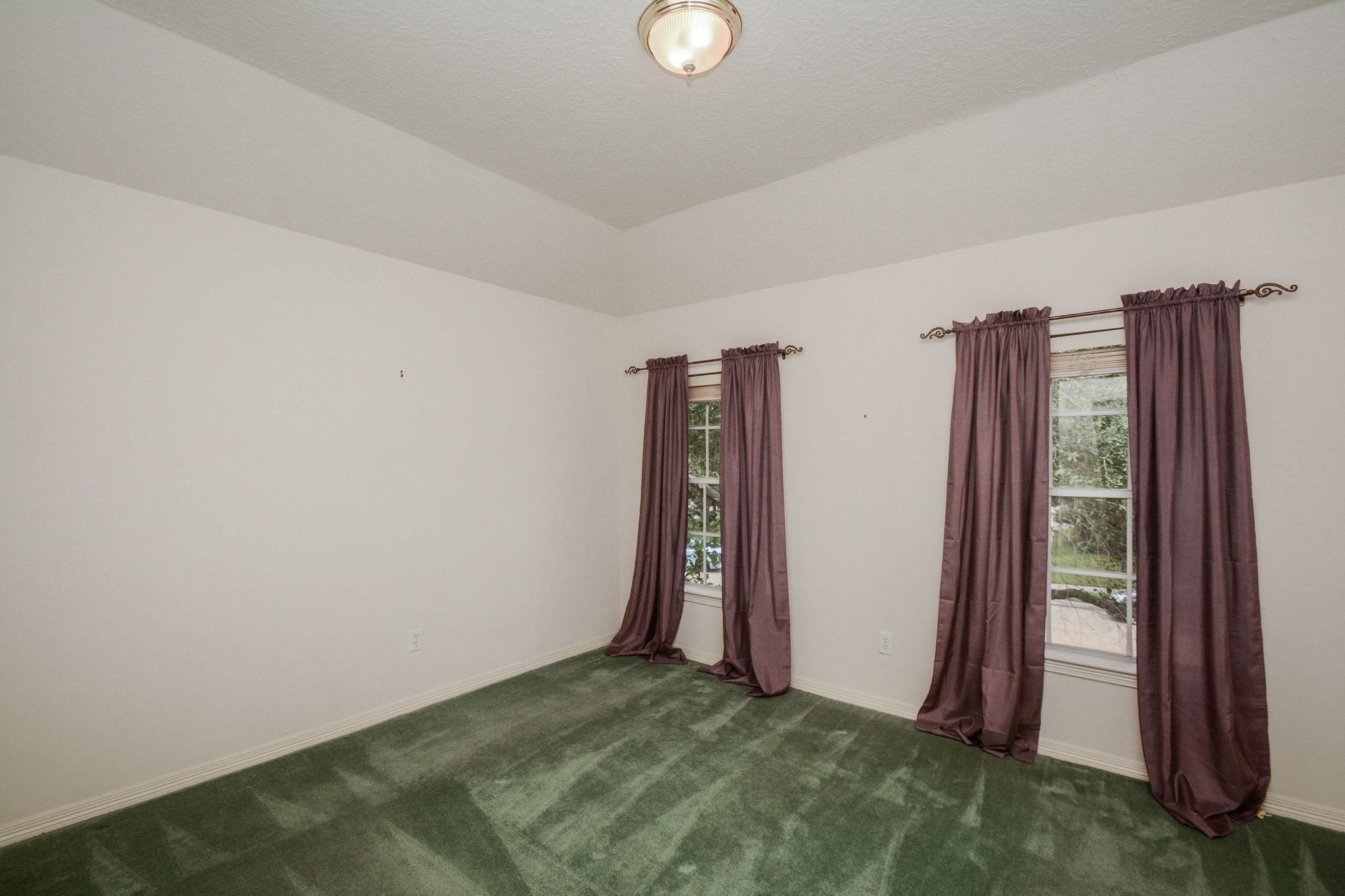 Bedroom 2 located at the front of the house