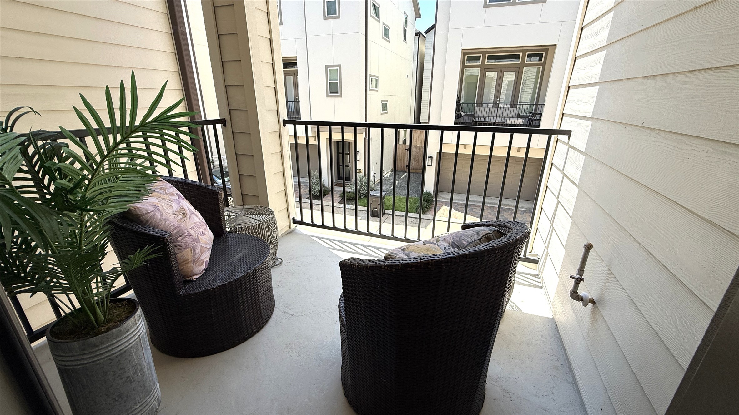 Nice 2nd level outdoor terrace looks onto the front community driveway