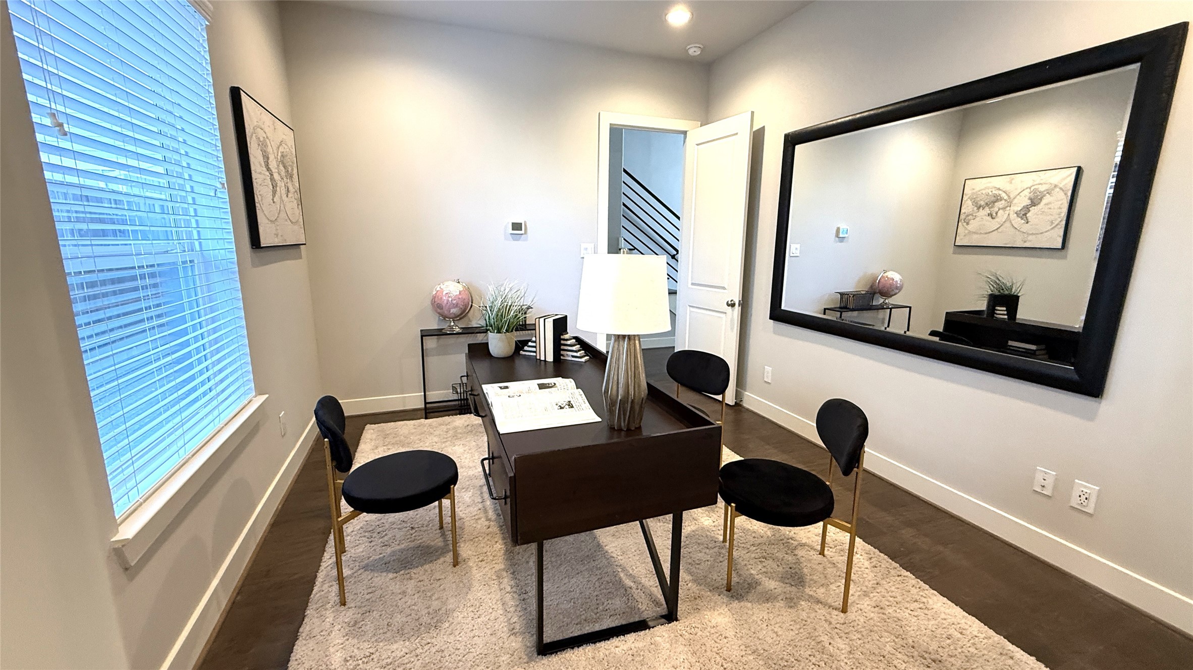 First floor bedroom with private bathroom is being staged as a home office.