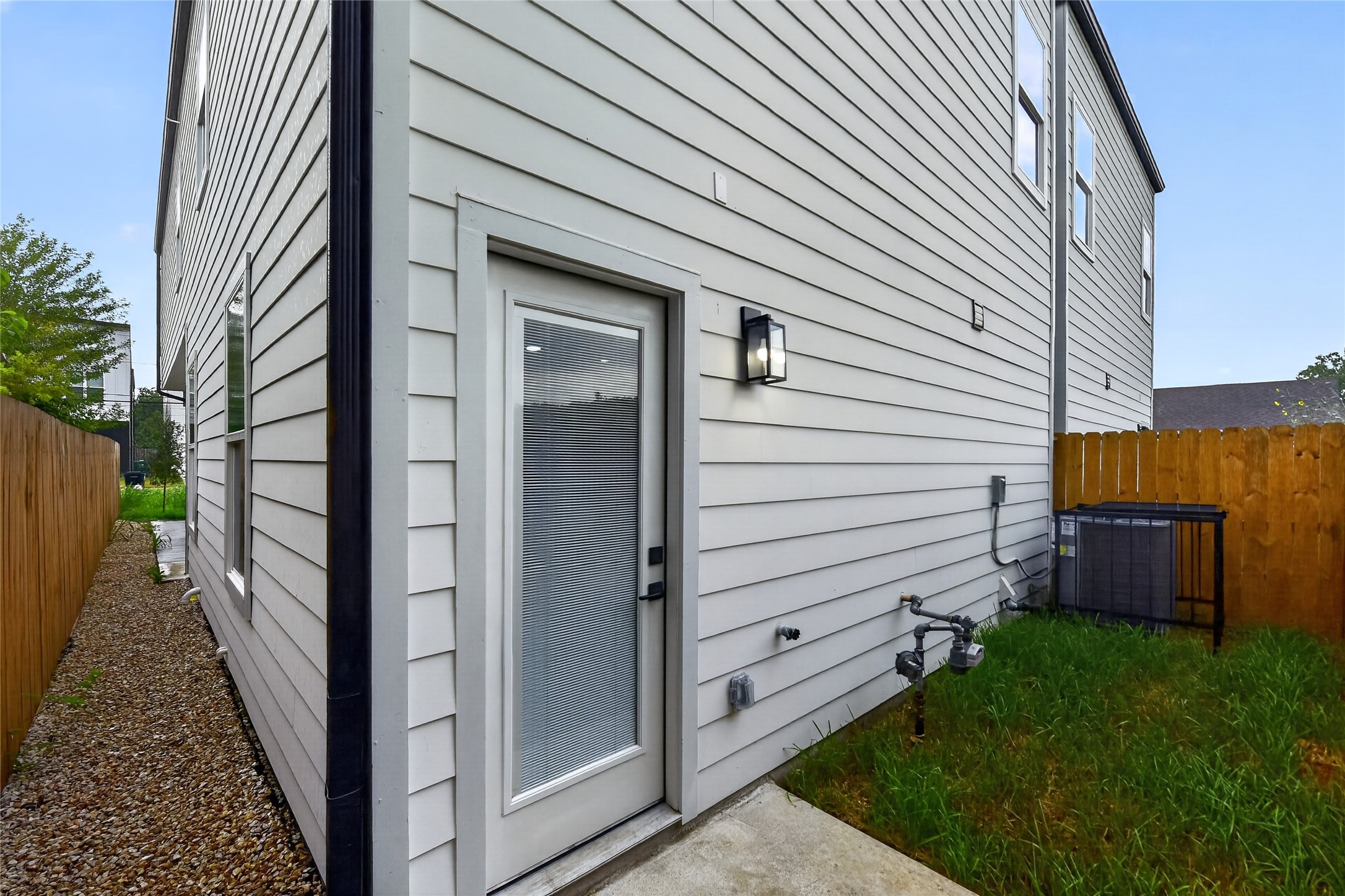 Enjoy a fenced backyard with private green space, perfect for relaxing, entertaining, gardening, or giving your four-legged friends room to play. A little outdoor space to make your own.