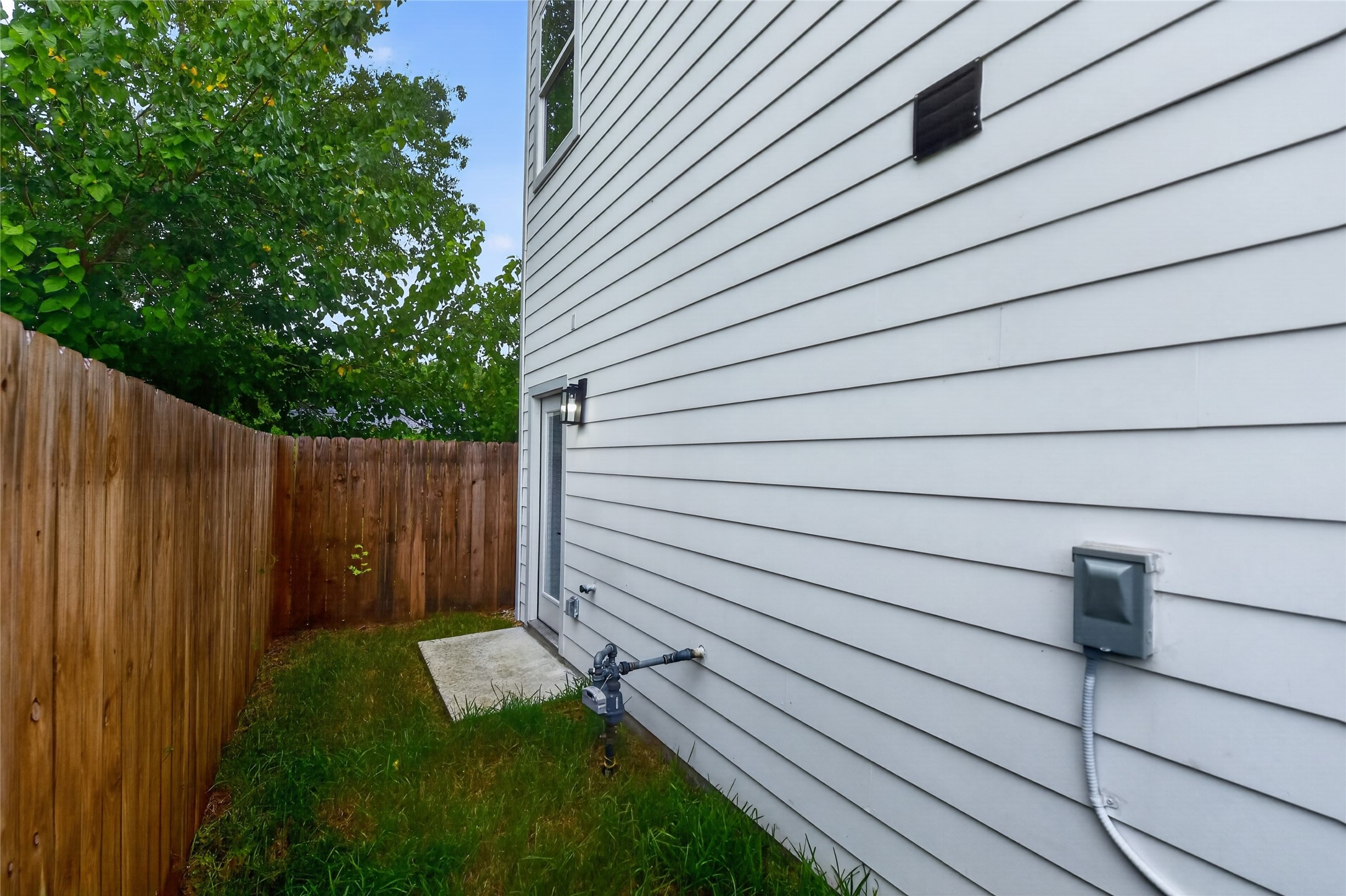 Enjoy a fully fenced backyard with a private green space, perfect for relaxing, entertaining, gardening, or giving your four-legged friends room to play. A little outdoor space to make your own.
