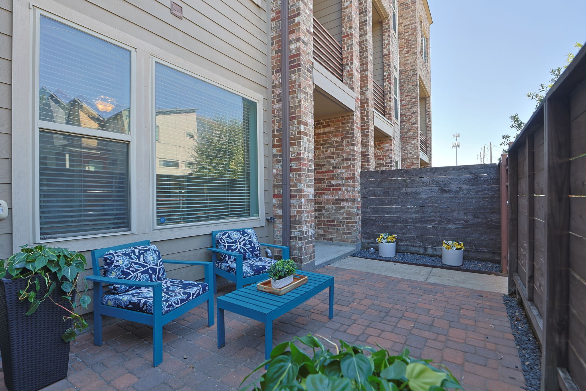 Looking back towards the entrance on your new patio! Room for gardening or let the dog out - also a park behind the house with doggy bags provided.