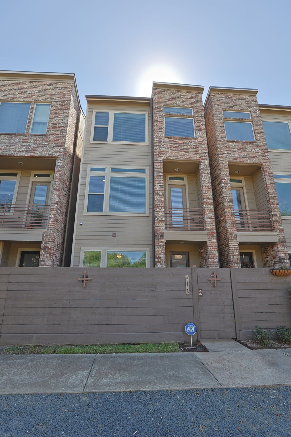 Beautiful almost new construction with a gated front entrance and gated garage entrance in back. 2 parks on the property and street parking in front for guests - very hard to find in the city!