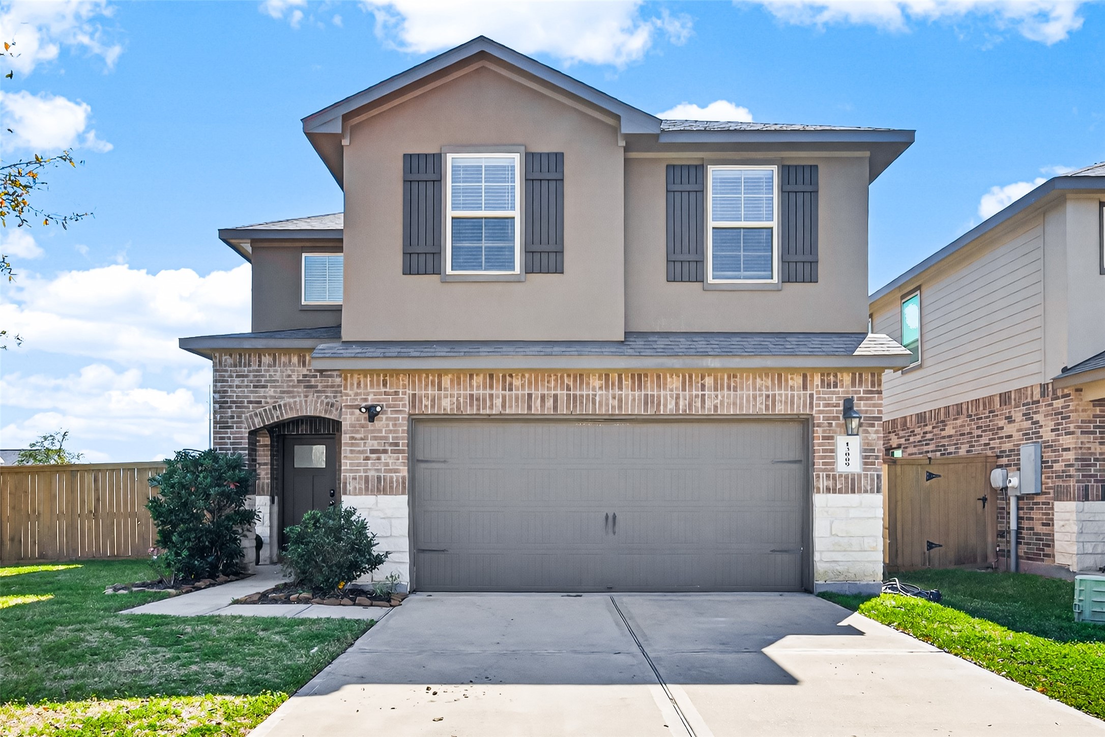 Beautiful curb appeal and a welcoming front entrance.