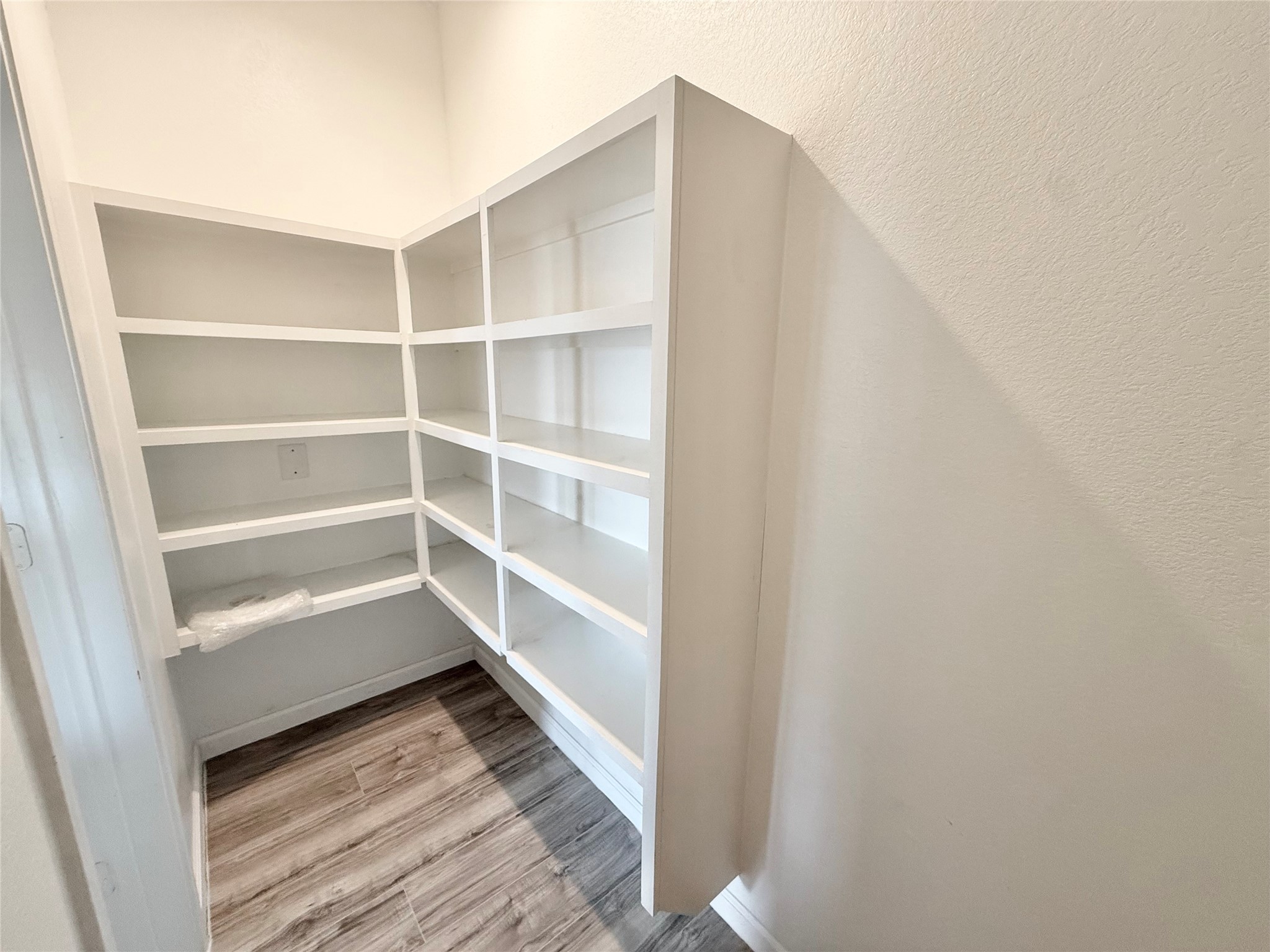 Oversized walk-in pantry with plenty of storage space.
