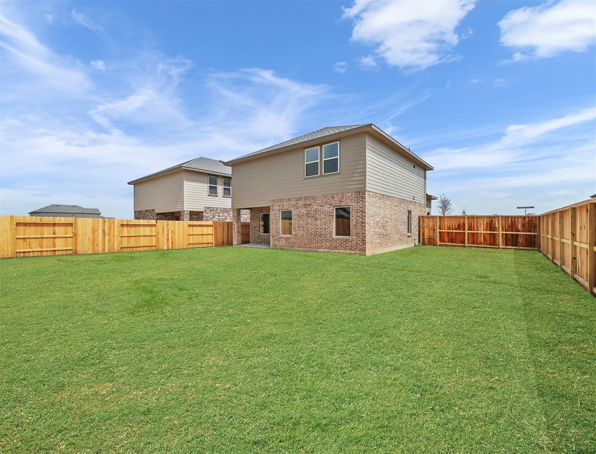 Spacious backyard with plenty of room to enjoy the outdoors.
