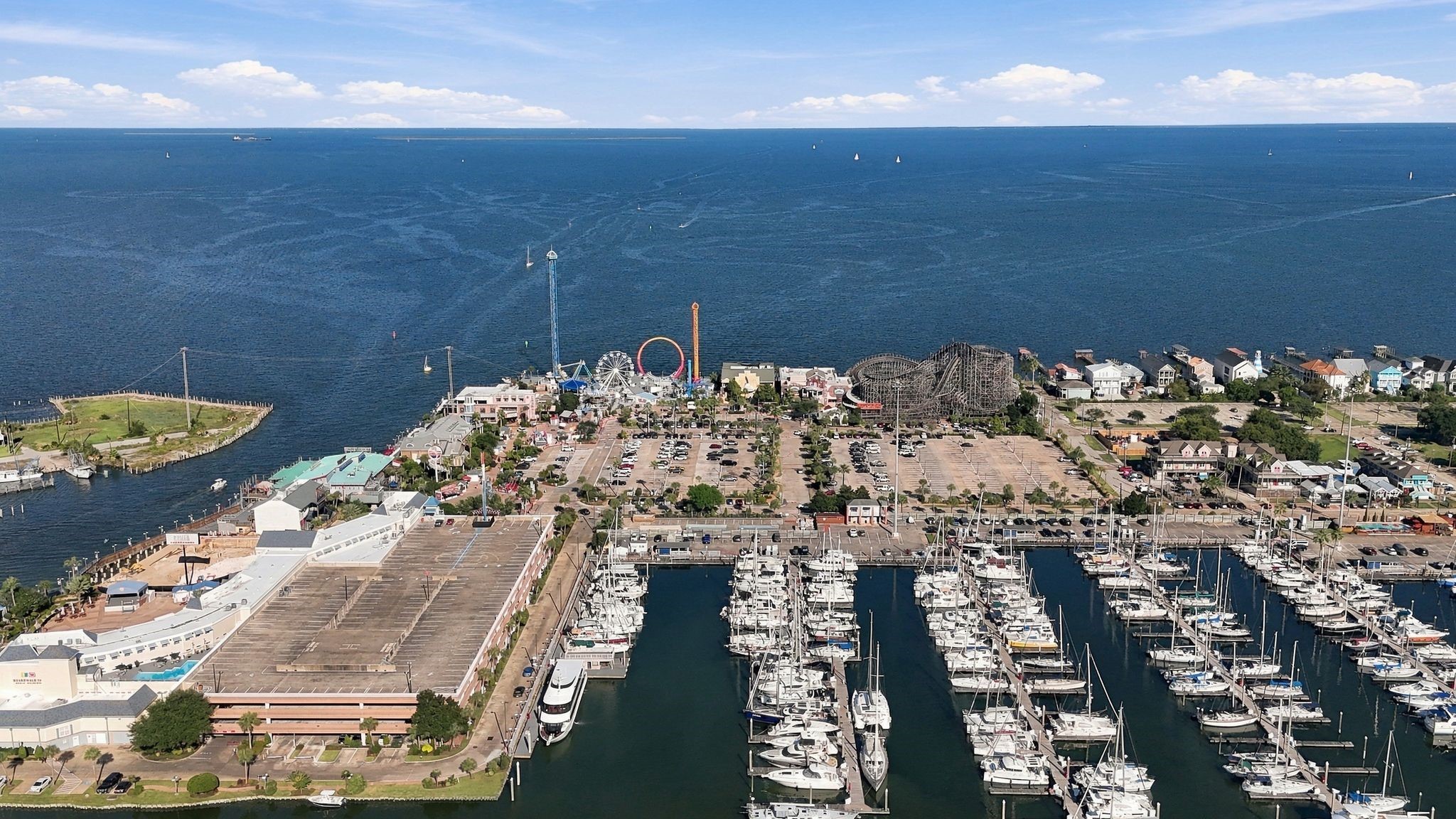 Prime waterfront location with stunning marina views, adjacent to Kemah Boardwalk and vibrant community amenities.