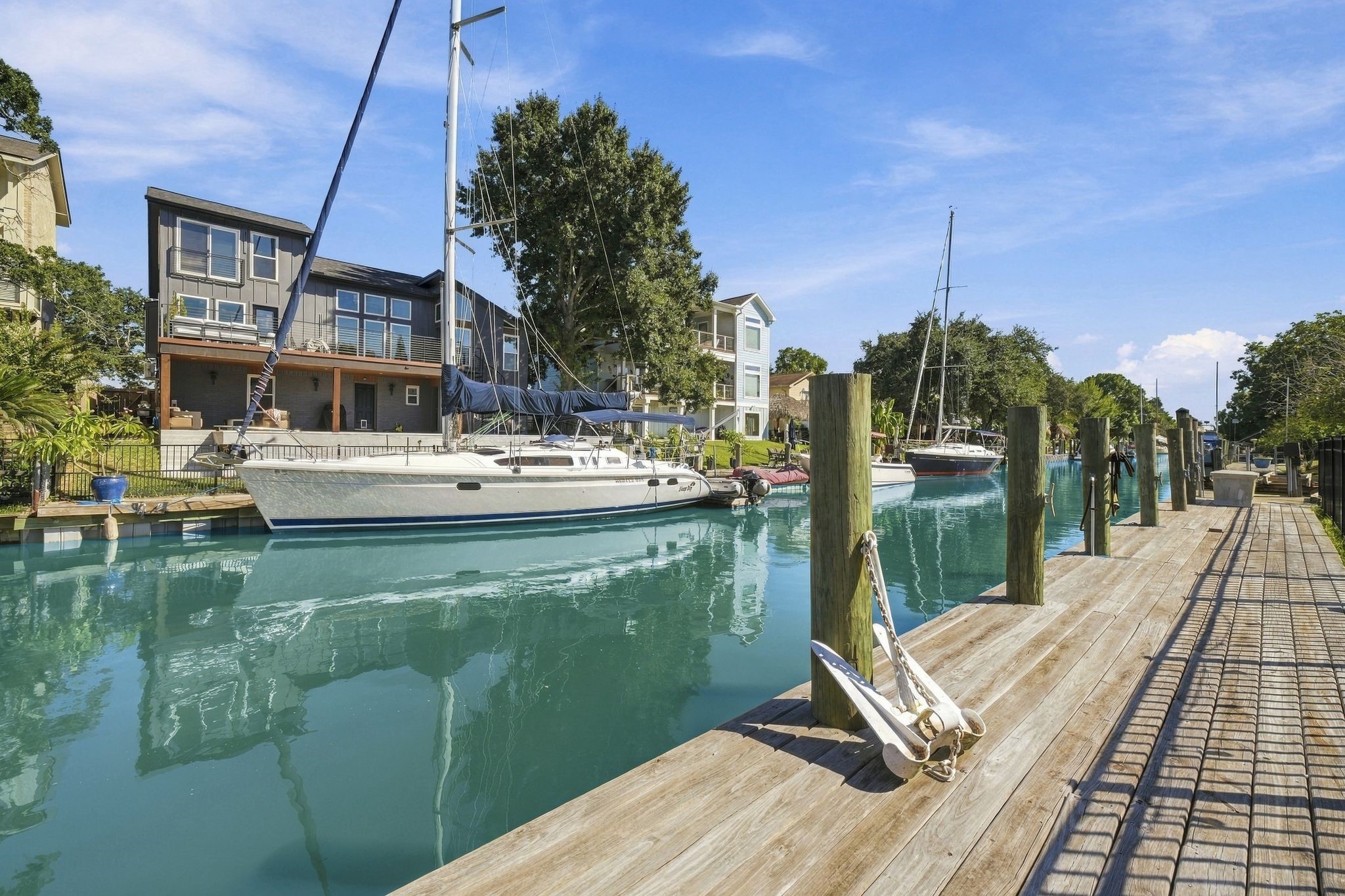 Enjoy waterfront living with direct canal access and a private dock, perfect for boating enthusiasts.