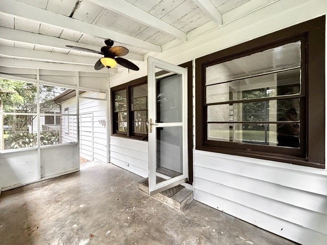 Screened in porch that needs a little bit of tlc to make it really cute!