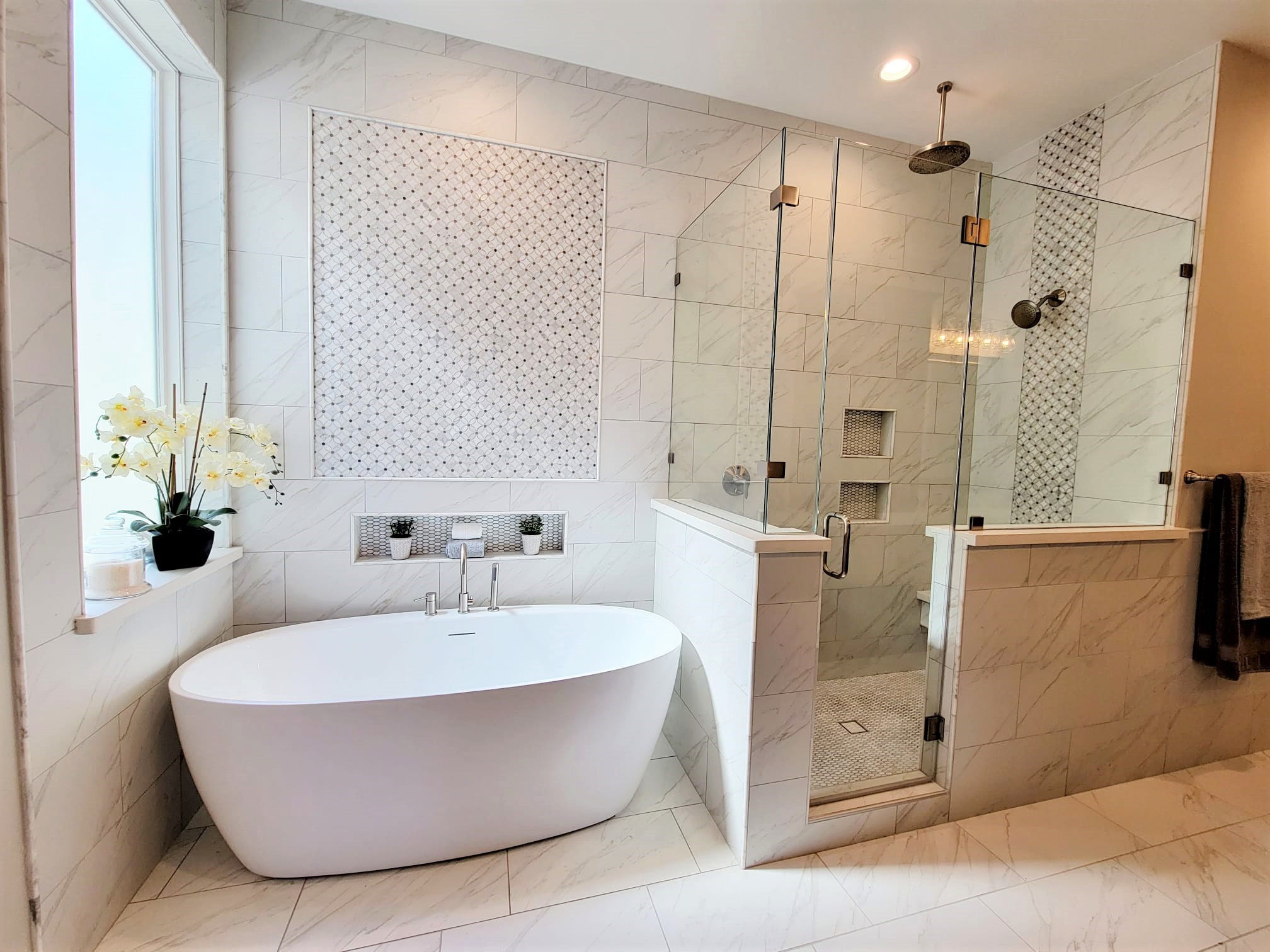 Luxurious stand alone tub with large walk-in shower. Enjoy the dual rain head shower.